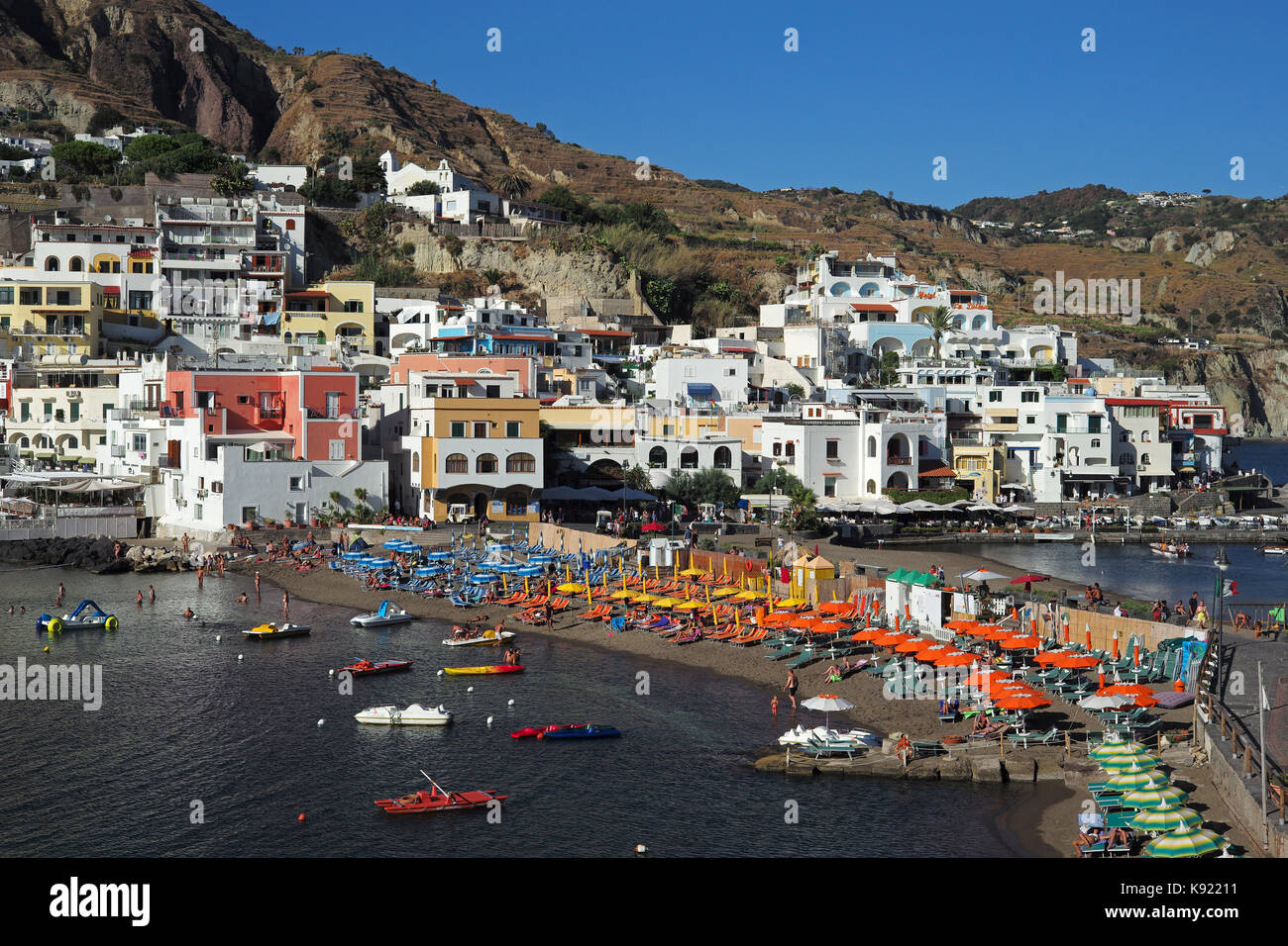 A view of the small town of Sant'Angelo, the seaside resort and fishing town on the rugged south coast on the Italian island of Ischia. Stock Photo