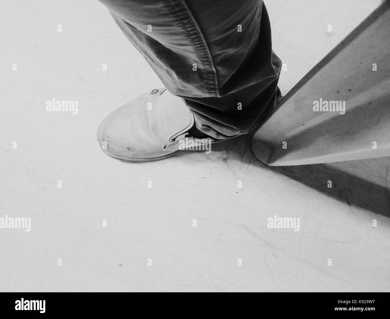 Human leg and chair's leg Stock Photo Alamy
