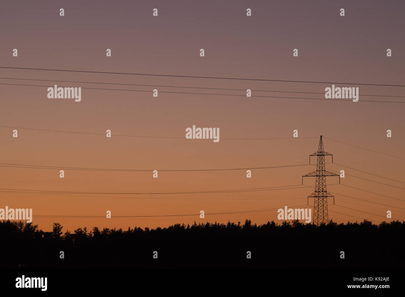 High voltage tower with silhouette sky sunset background Stock Photo ...
