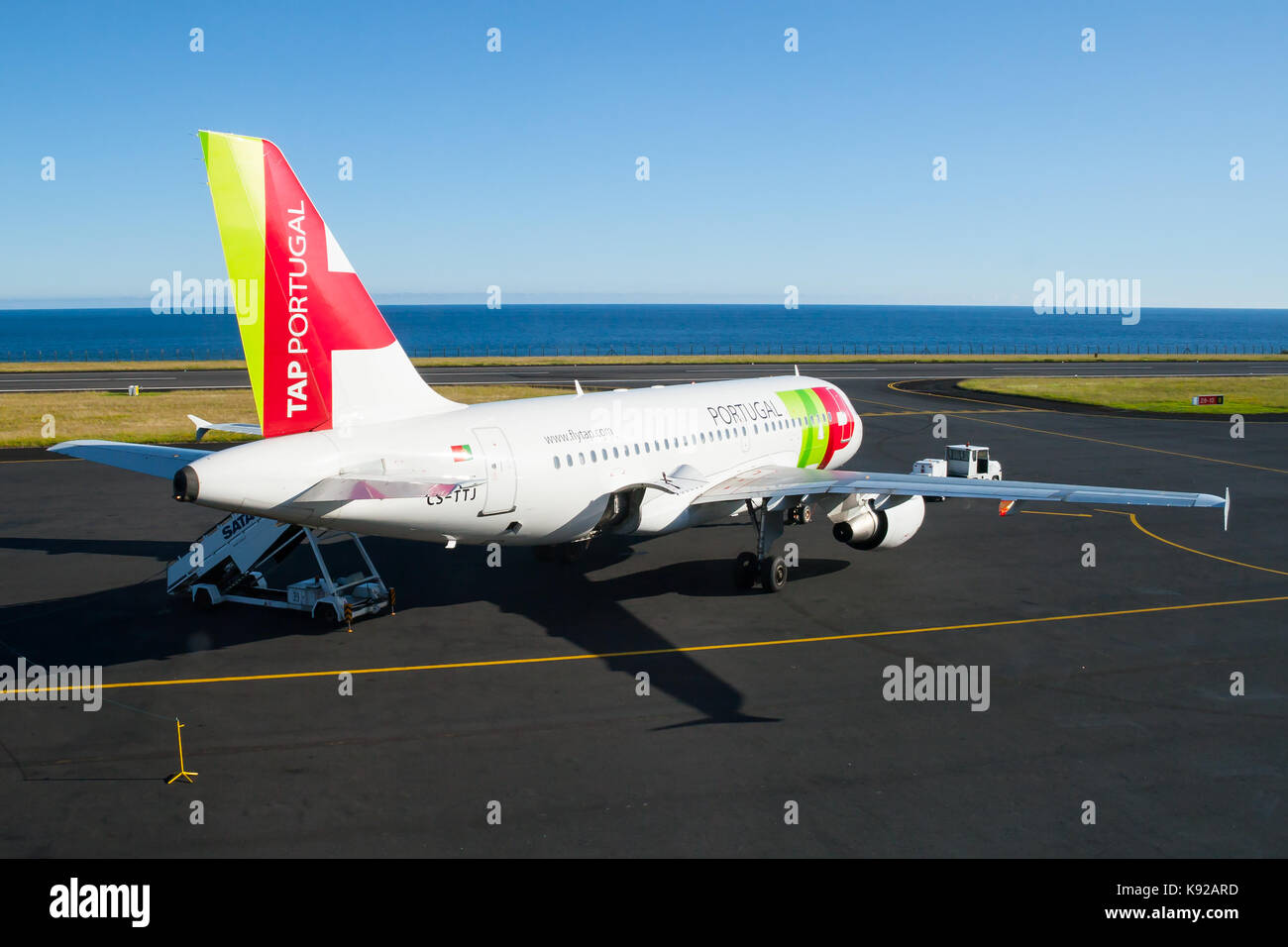 A TAP Portugal Airbus A319 preparing to depart from Horta Airport in The  Azores Stock Photo - Alamy