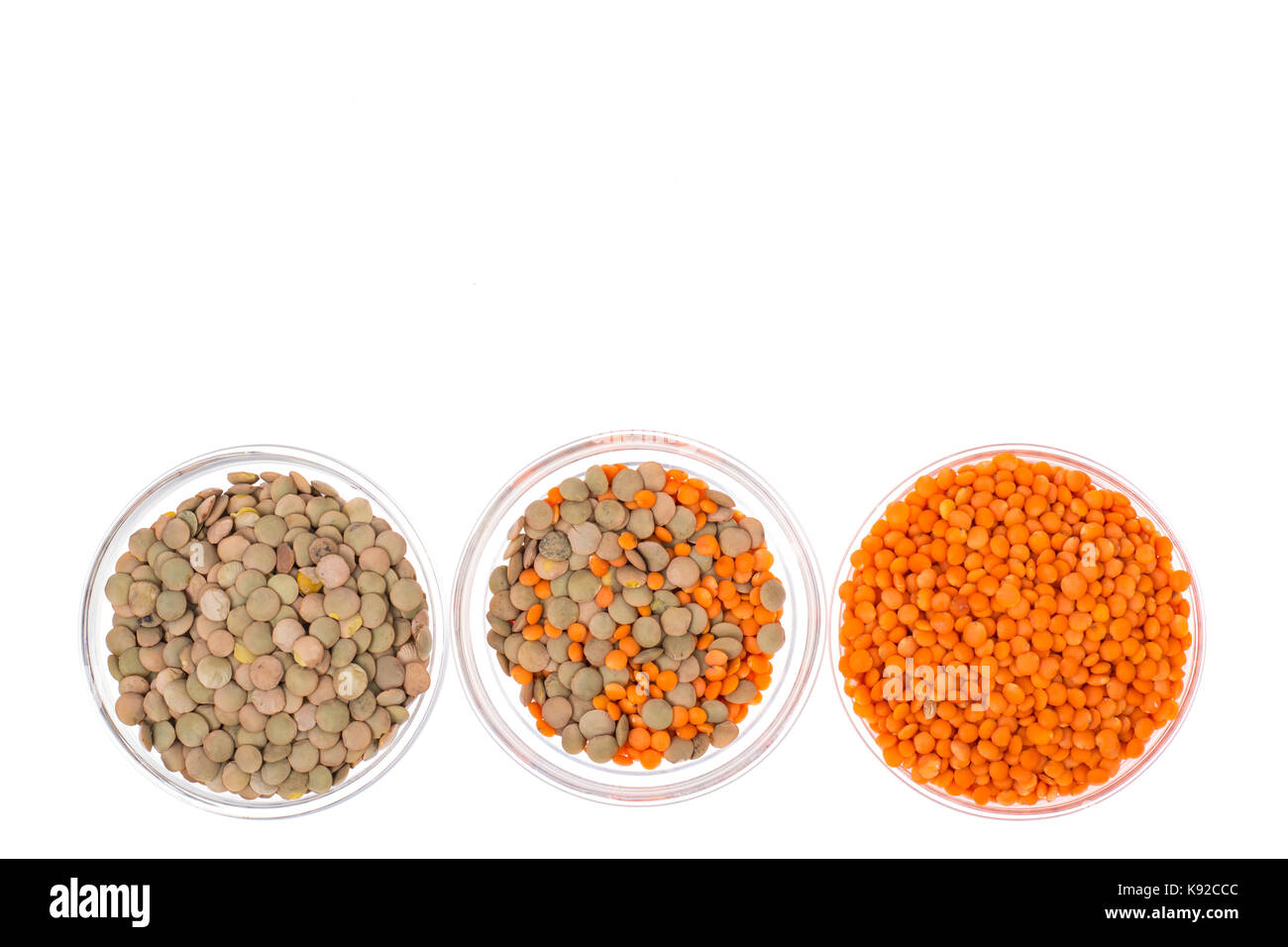 Chickpeas, orange lentils in and green, isolated on white. Studio Photo Stock Photo
