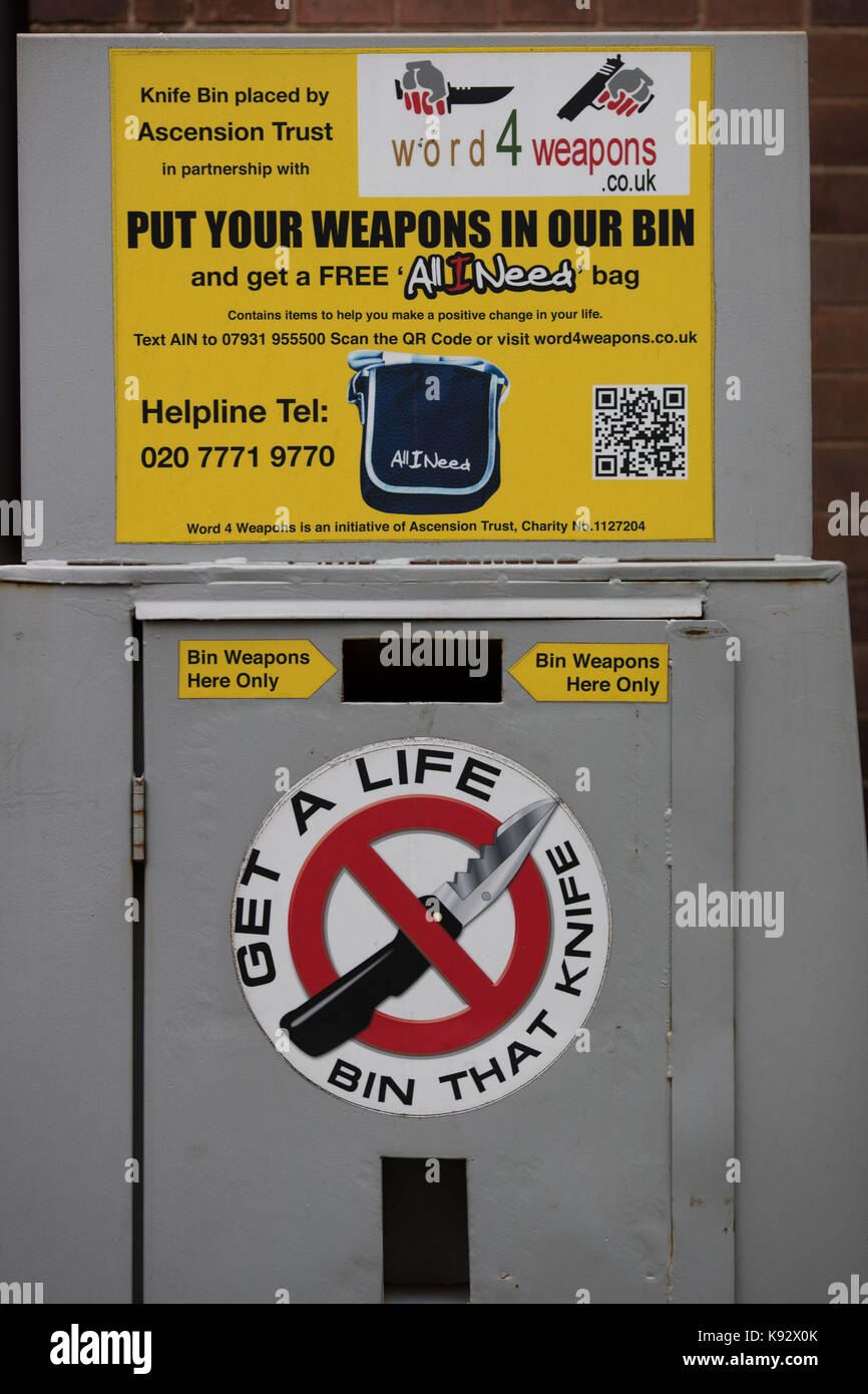 A knife surrender bin located outside the New Testament Church of God ...