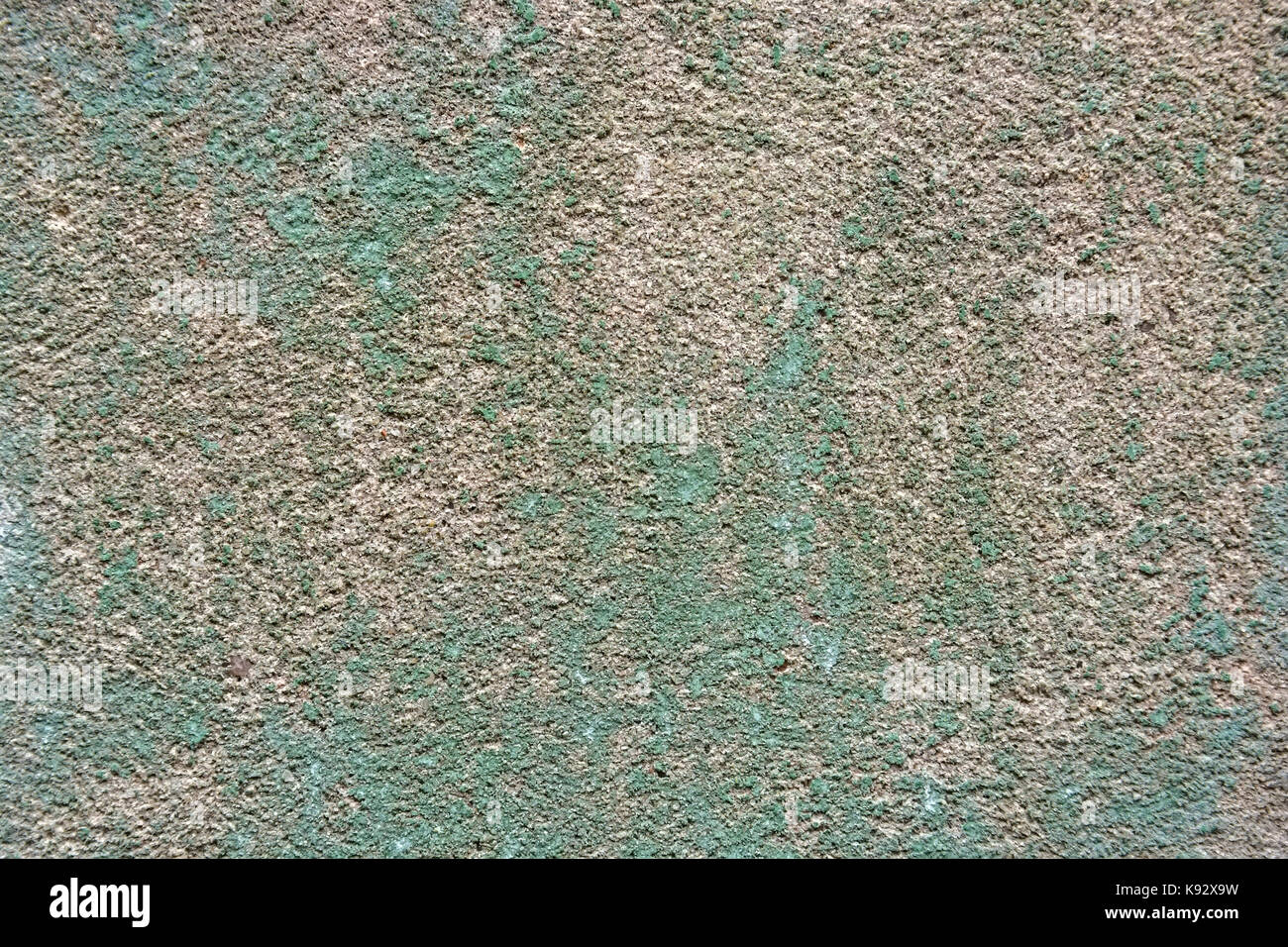 Close up uneven plaster surface with green paint Stock Photo Alamy