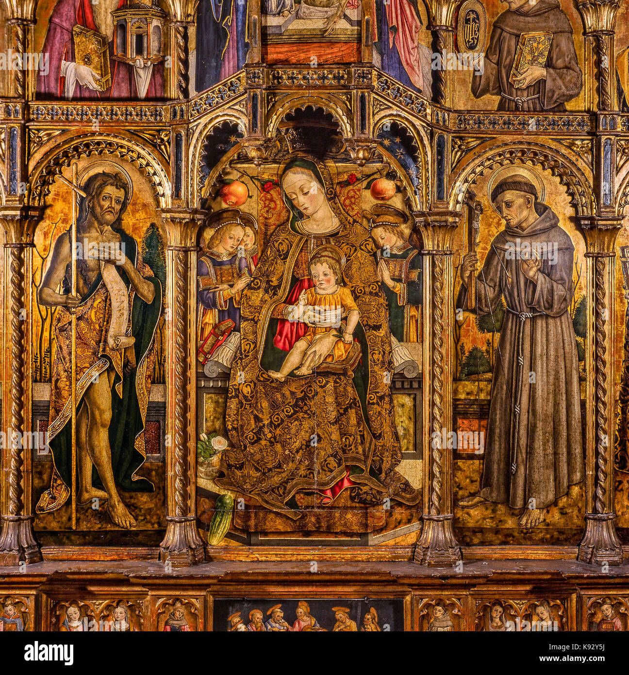 Italy Marche San Severino Marche -picture gallery- Vittore Crivelli -polyptych - Madonna and Child in the center, left St. John the Baptist and right St. Francis Stock Photo