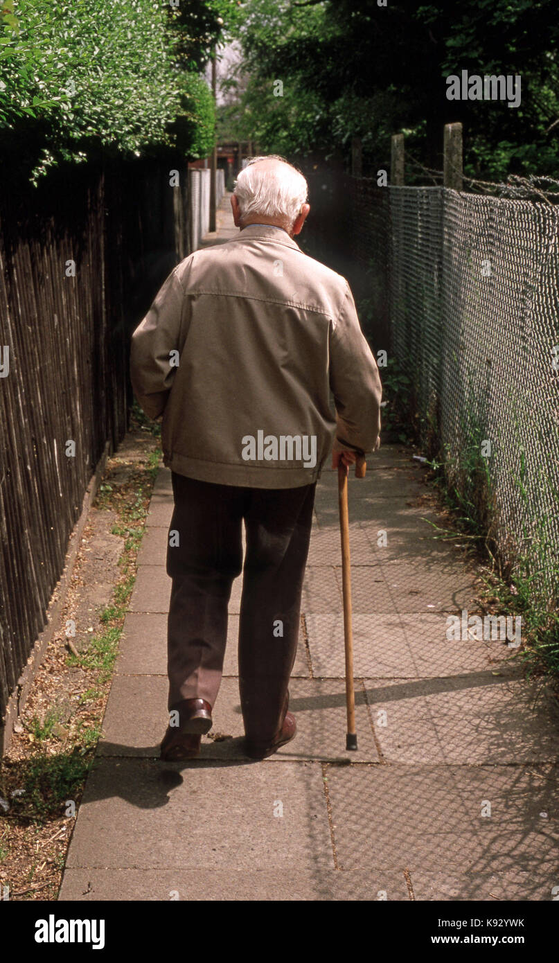 Old person walking stick feet hi-res stock photography and images - Alamy