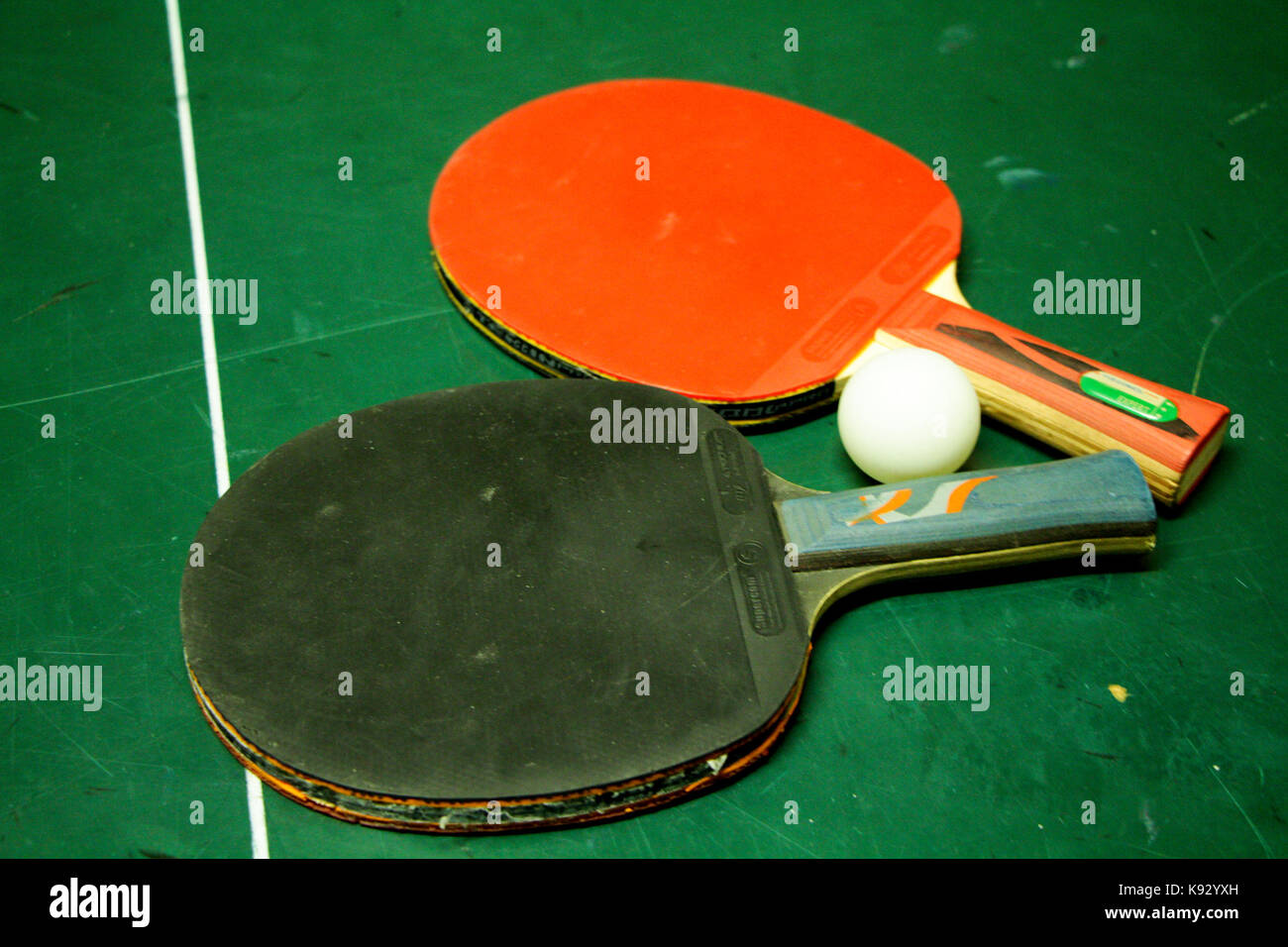 Tabletennis or ping pong rackets and balls on table Stock Photo Alamy