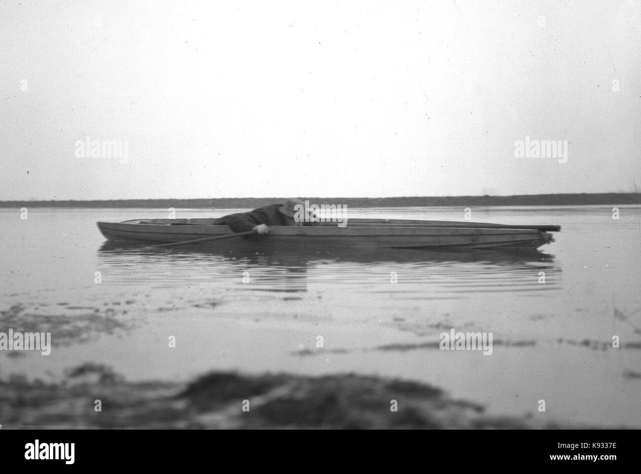 Laid low in the punt YORYM S379 Stock Photo