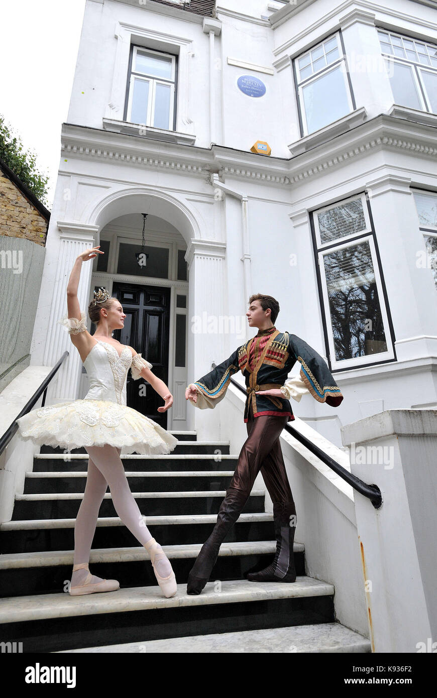 Dancers from the Royal Ballet School, Madison Bailey and Jordan Martinez,  who is wearing a costume from Rudolf Nureyev's own collection, pose during  the unveiling of an English Heritage blue plaque to