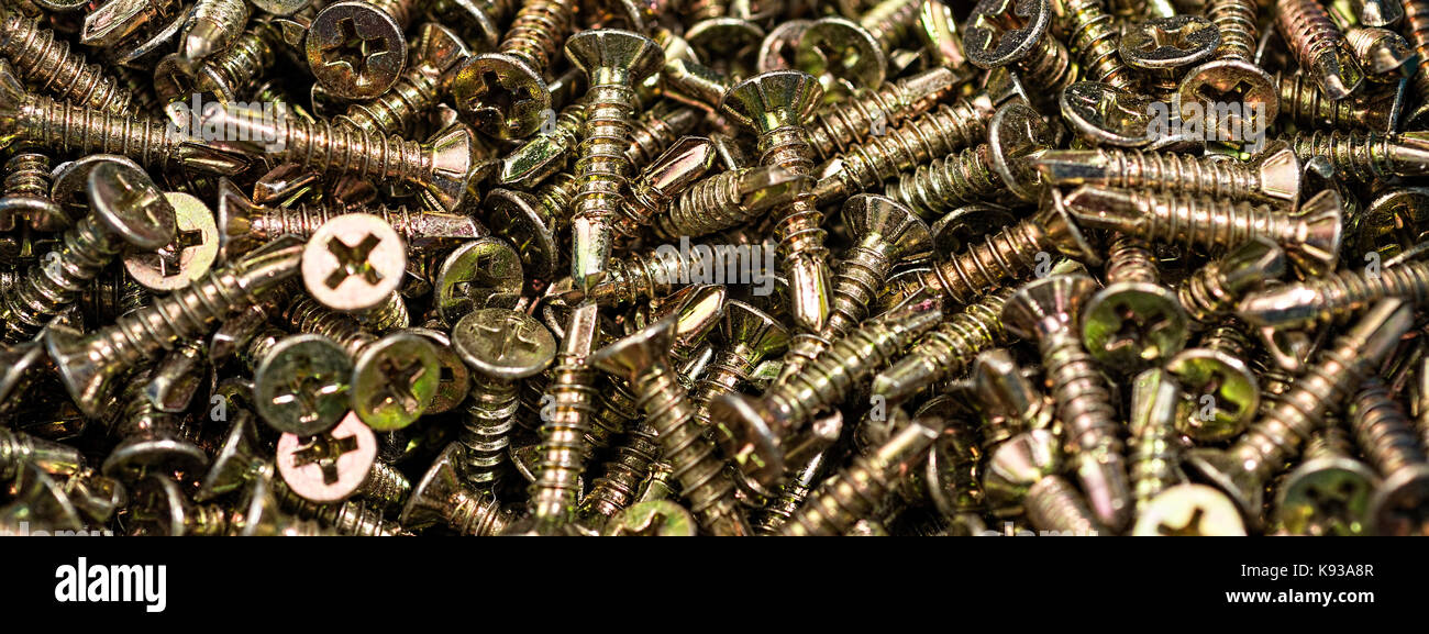 Golden Screws Macro Close Up. Background Pattern Stock Photo - Alamy