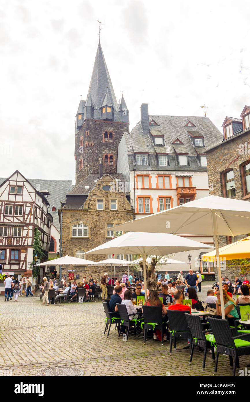BERNKASTEL-KEUS, GERMANY - 5TH Aug 17:  Tourists relaxes at Karlsbader Platz, also known as Karlovy Square in English, a popular square in the town. Stock Photo