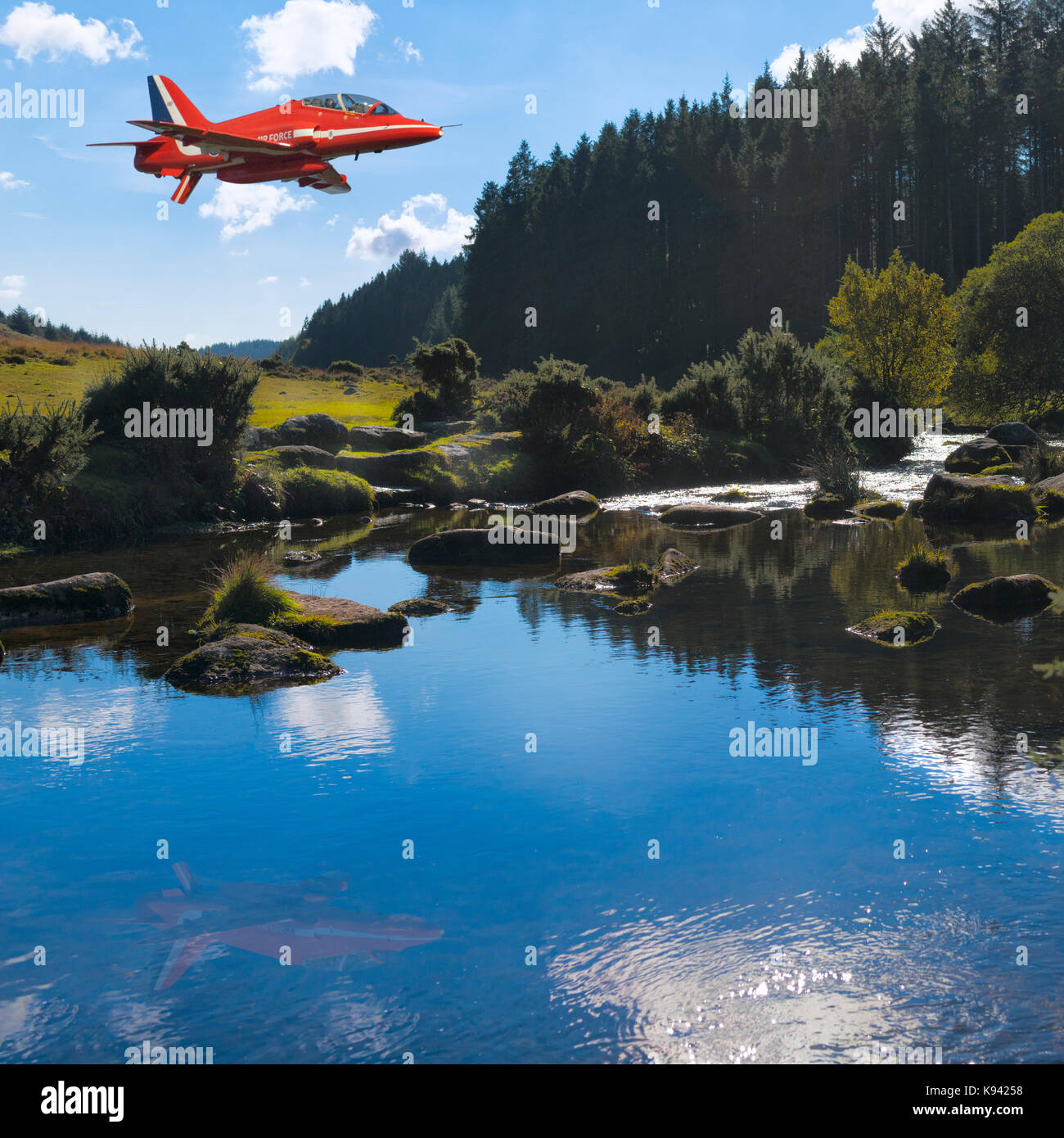 Composite image of lone Red Arrow flies low over The River Dart at Bellever on Dartmoor, Devon - UK Stock Photo