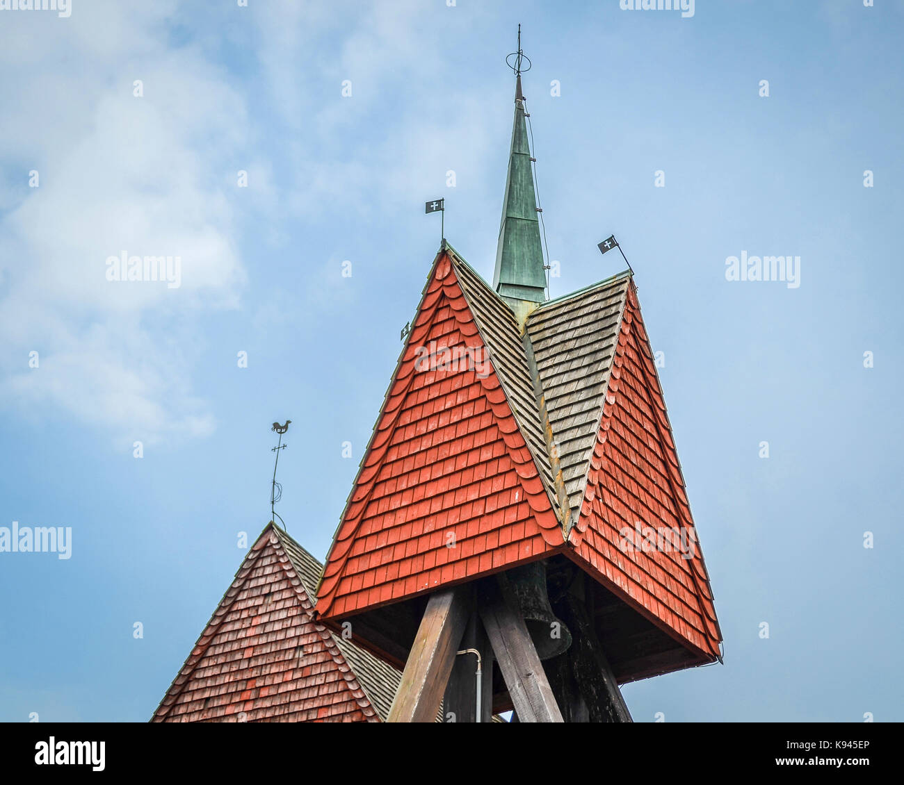 Close up of the roof and bell tower of a gabled roof in Copenhagen. Stock Photo