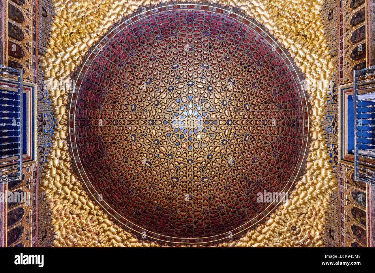 Interior low angle view of golden dome in the Hall of Ambassadors, Alcazar de Seville, Andalusia, Spain. Stock Photo