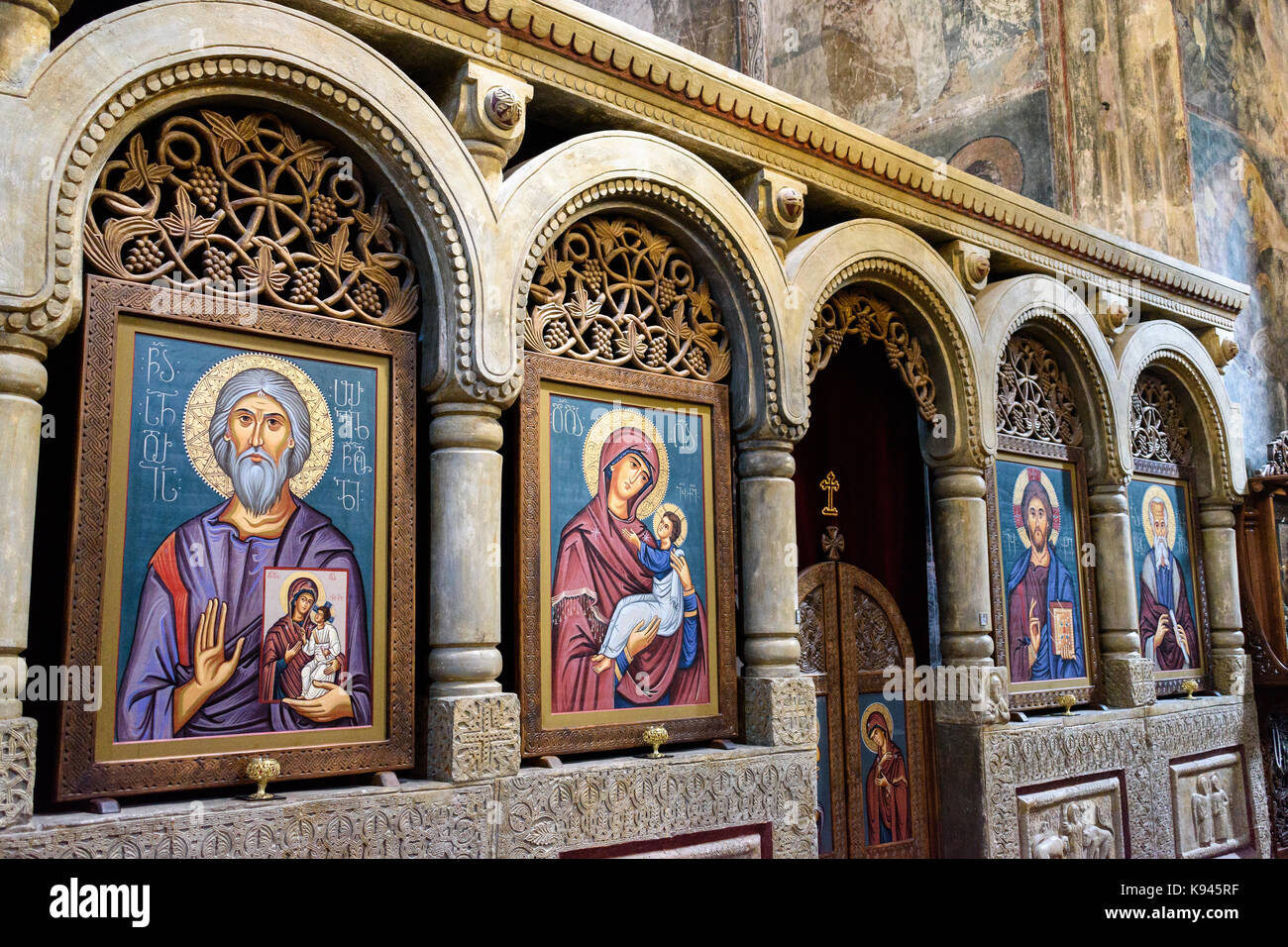 Interior view of the medieval Sapara Monastery. Arches and icon paintings. Stock Photo