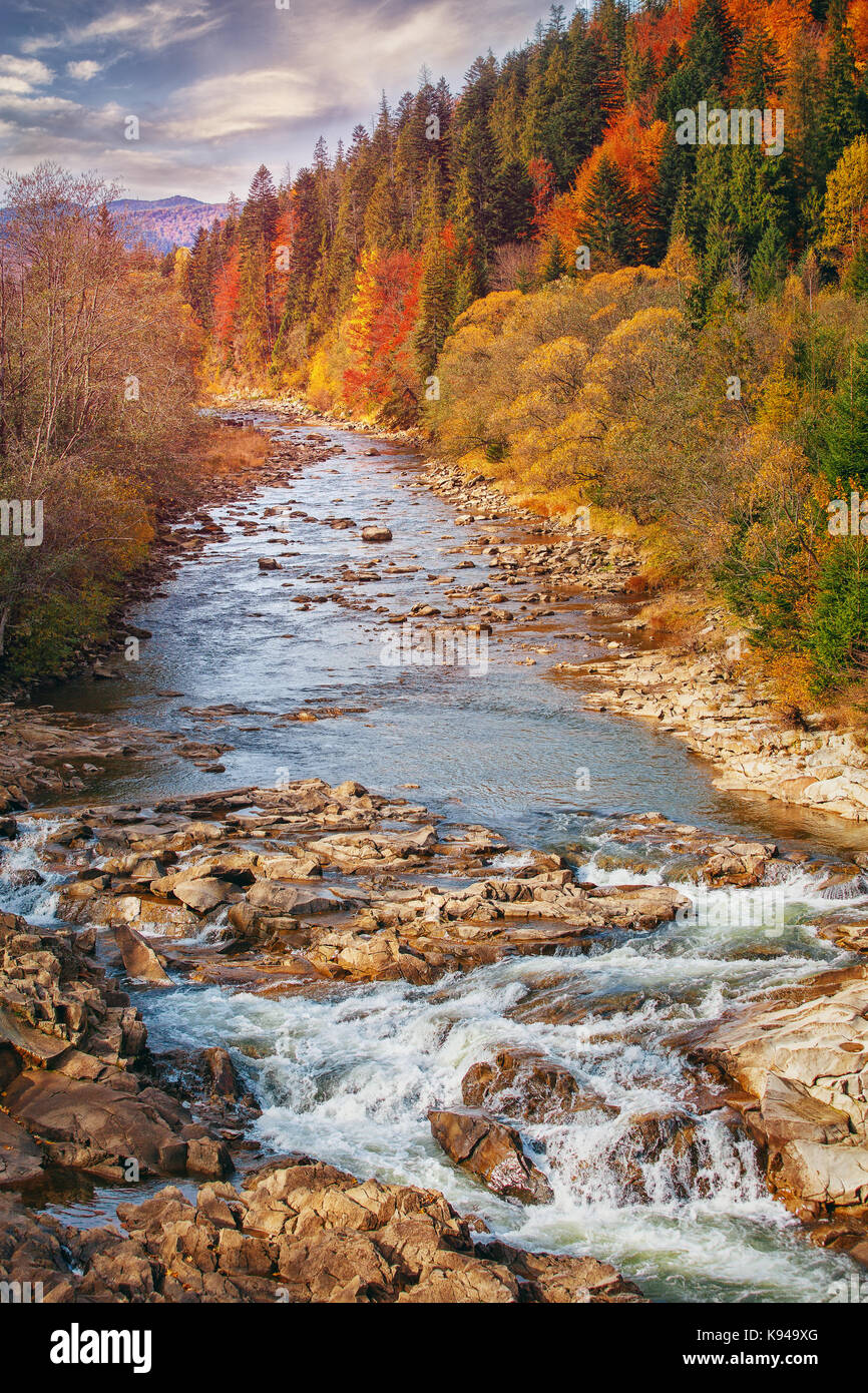 Late Autumn Landscape. A stormy mountain river with stones in the mountains Stock Photo