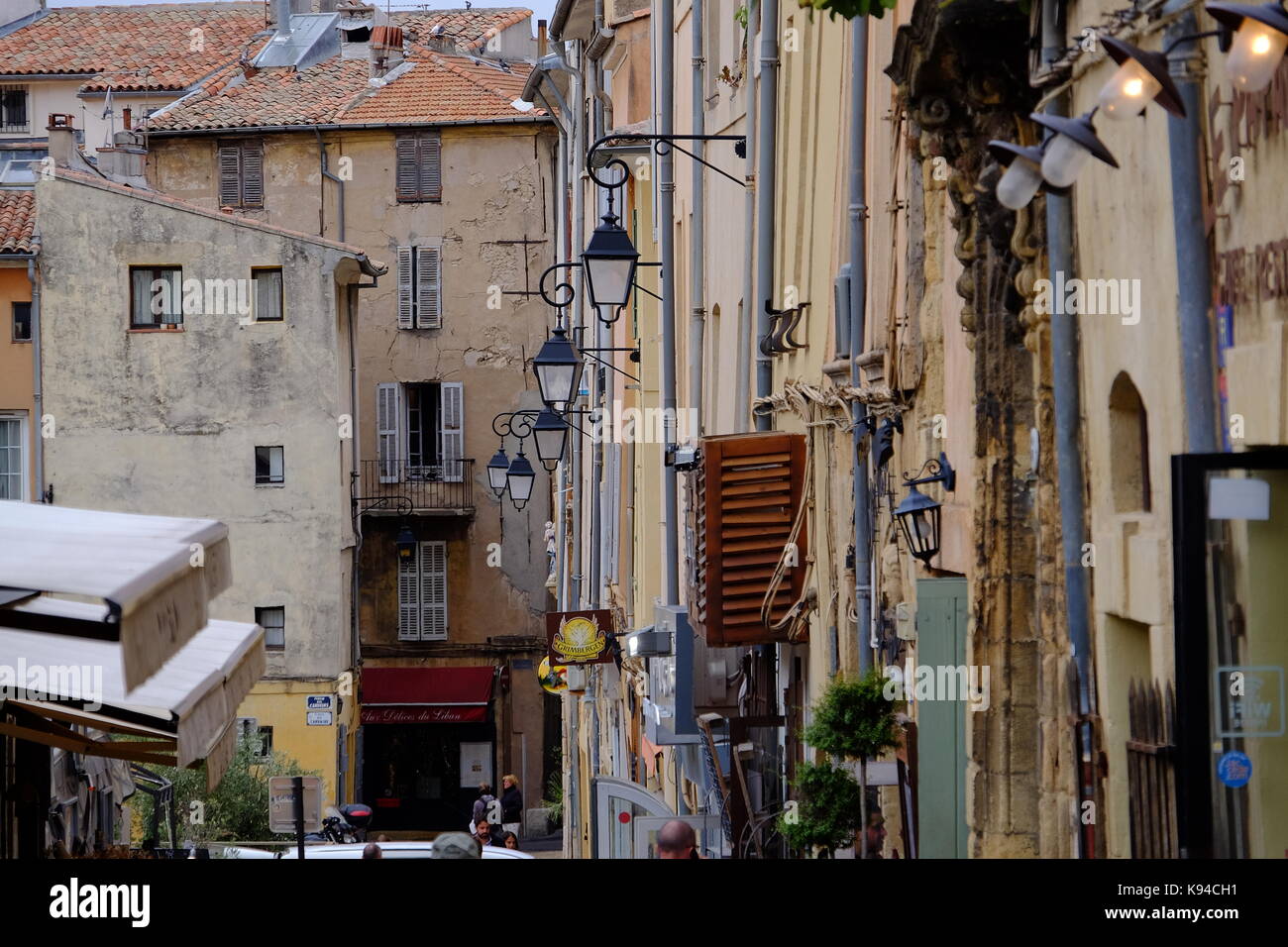 Old buildings and street lamps in Aix en Provence, South Of France Stock Photo