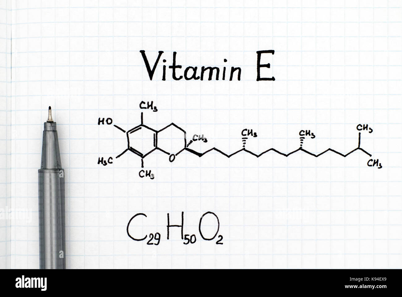 Chemical formula of Vitamin E with black pen. Closeup Stock Photo Alamy