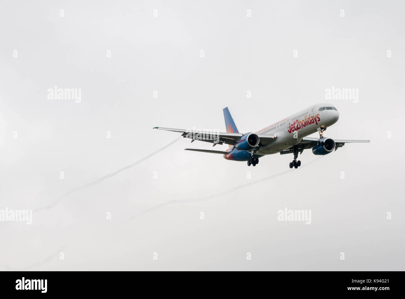 BOEING 757-236 aircraft, reg G-LSAD, operated by carrier Jet2, approaches Leeds/Bradford airport for landing. Stock Photo