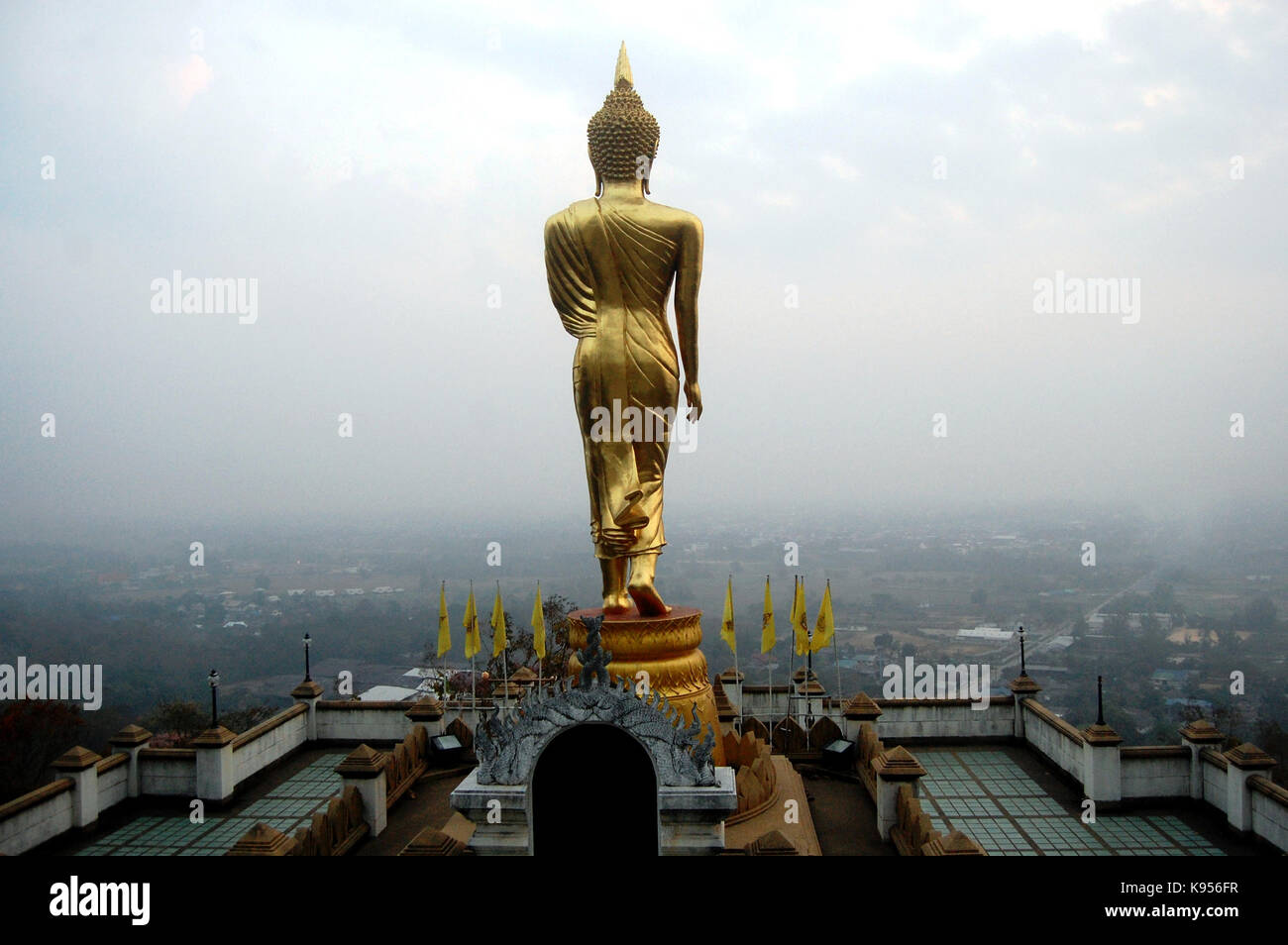 View point and buddha walking statue at Wat Phra That Khao Noi temple ...