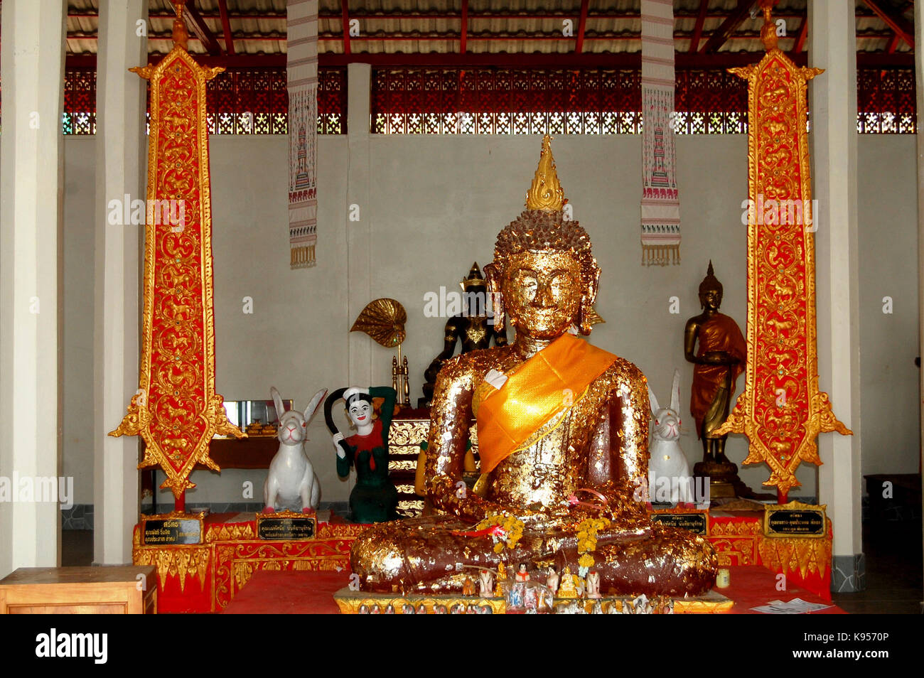 Golden buddha statue in church of Wat Phra That Khao Noi temple for ...