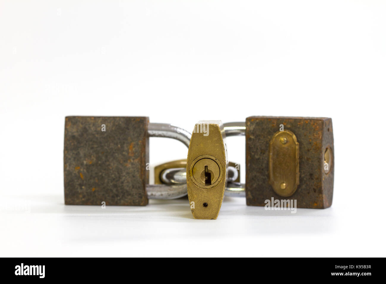 Close up on locked padlock over white background concept Stock Photo ...