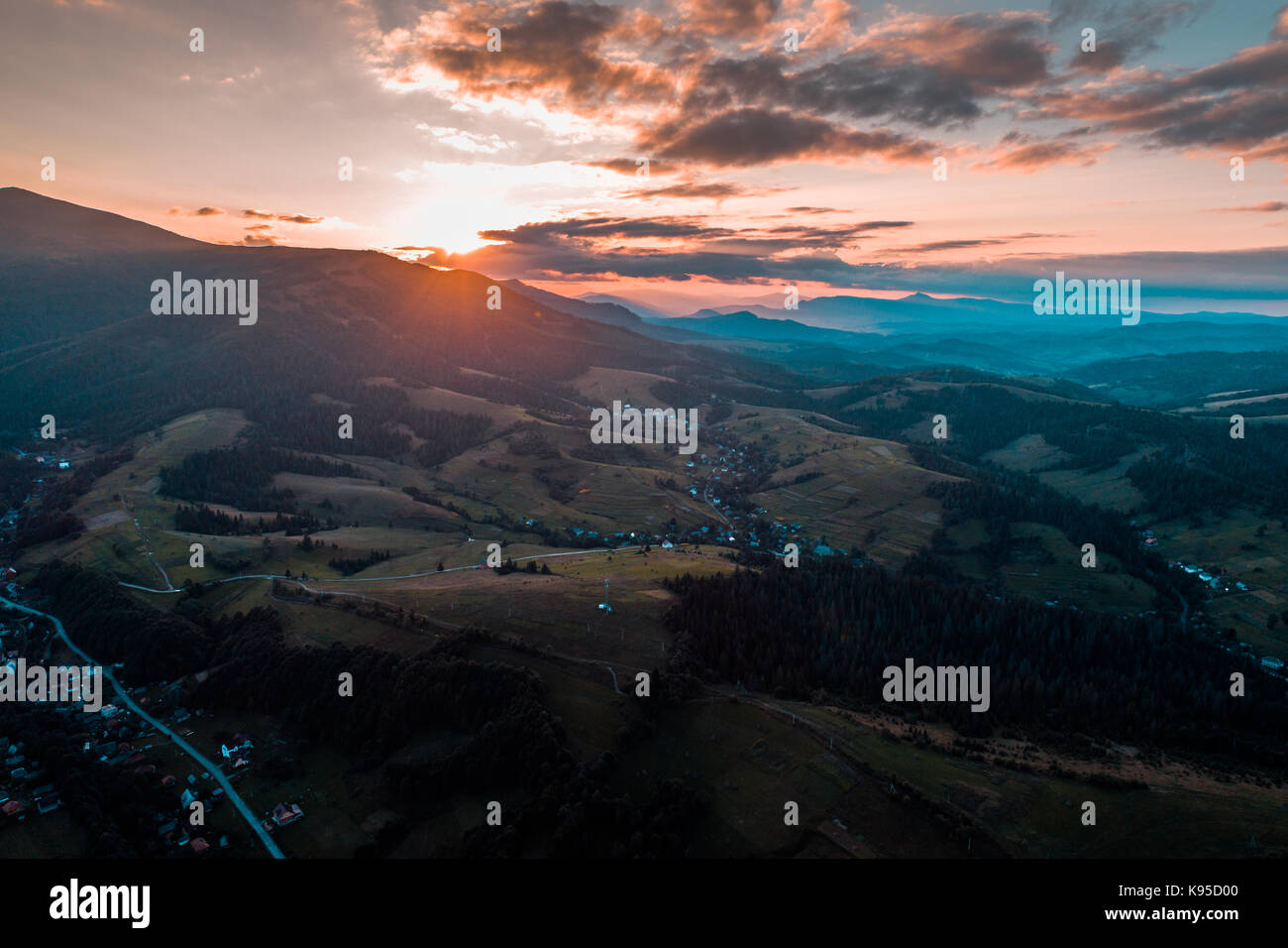 Aerial view of the village in the Carpathian mountains on the Sunset ...