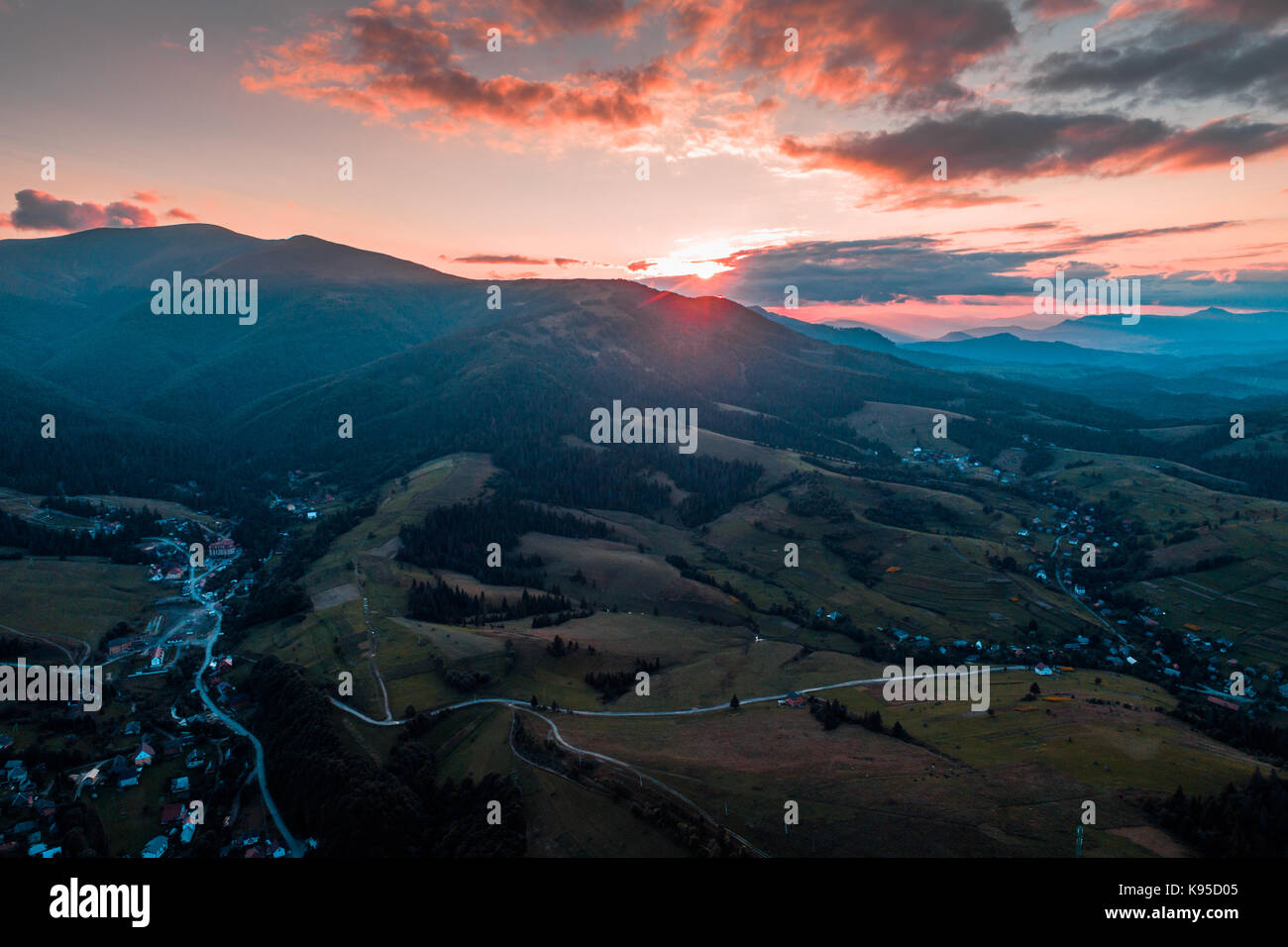 Aerial view of the village in the Carpathian mountains on the Sunset ...