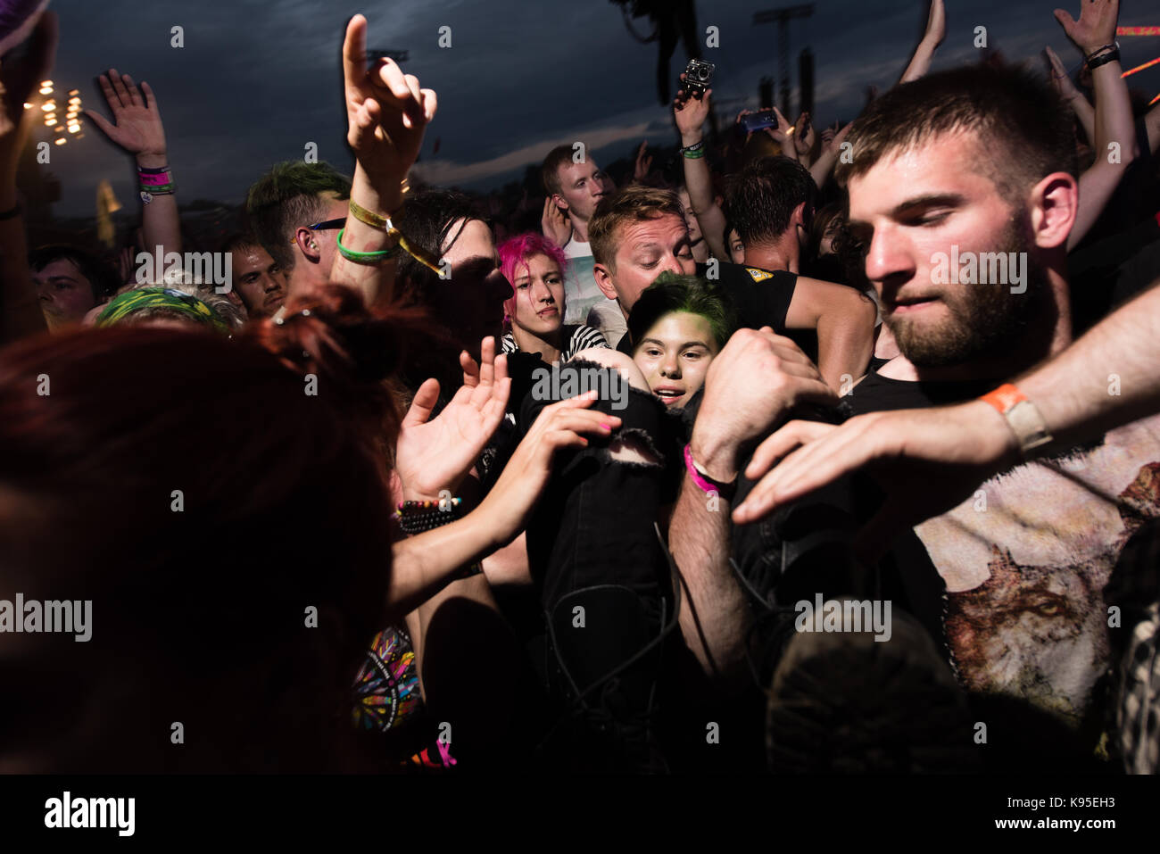 Music fans on front of the main stage of Woodstock Festival Poland music festival. Stock Photo