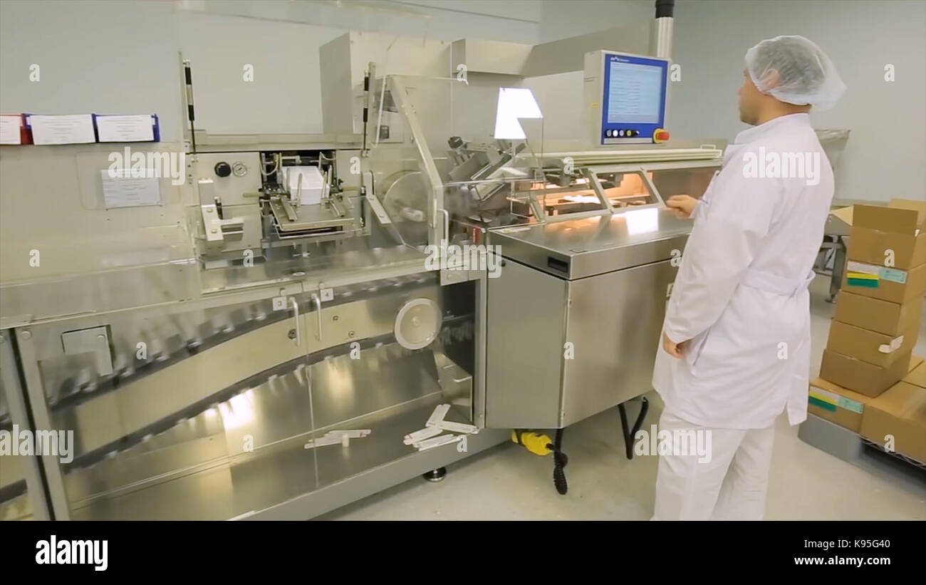 Pharmaceutical quality control production line hi-res stock photography ...