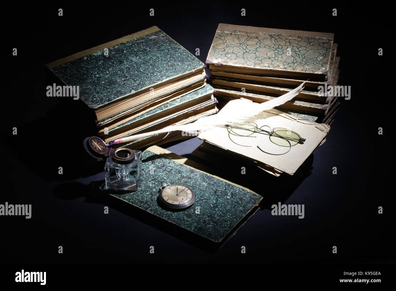 old books, papers, ink pen and inkpot on black background Stock Photo ...
