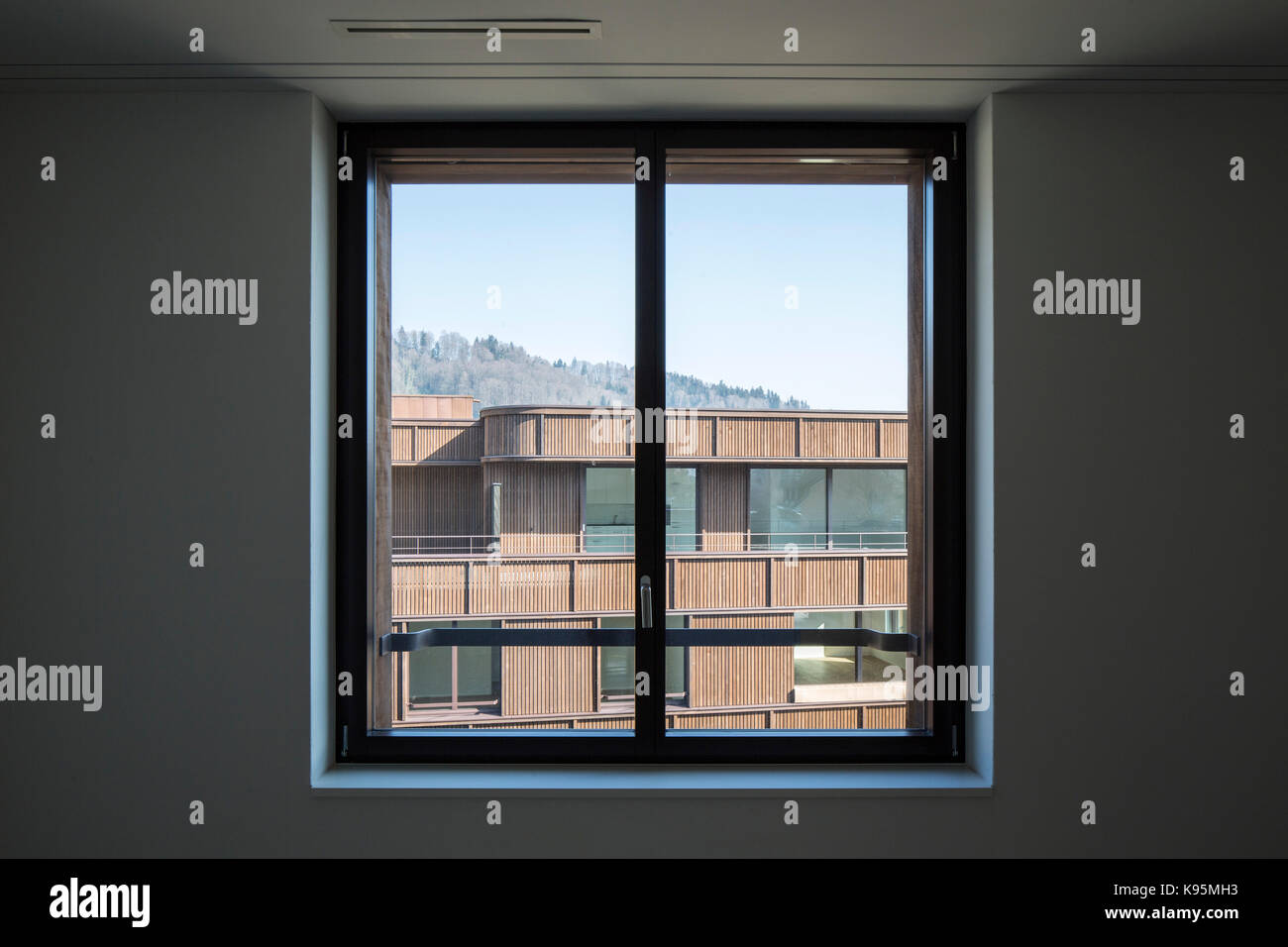 View through. Housing estate Malters, Malters, Switzerland. Architect: Diener & Diener, 2016. Stock Photo