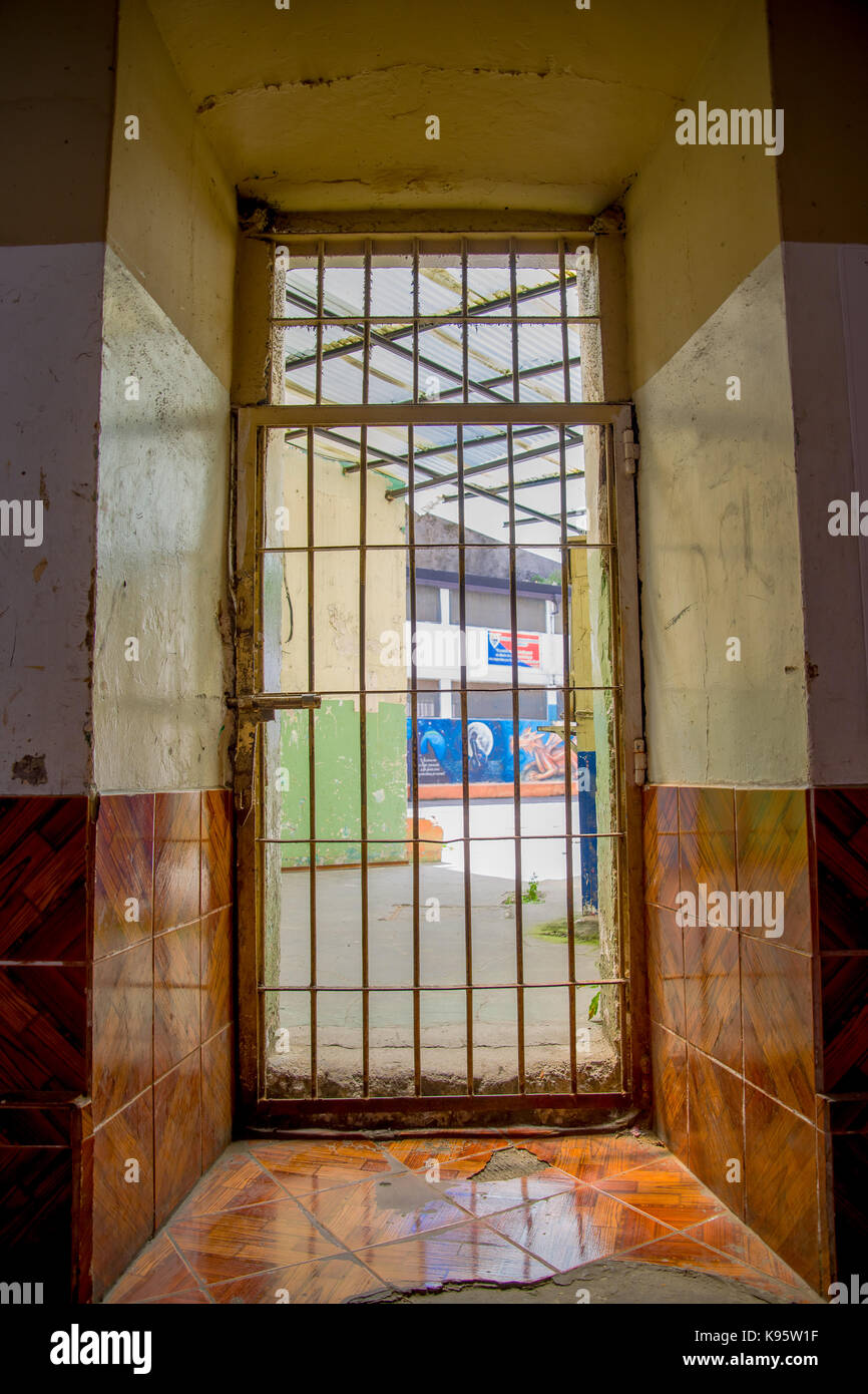 QUITO, ECUADOR NOVEMBER 23, 2016 Indoor view with a door with bars