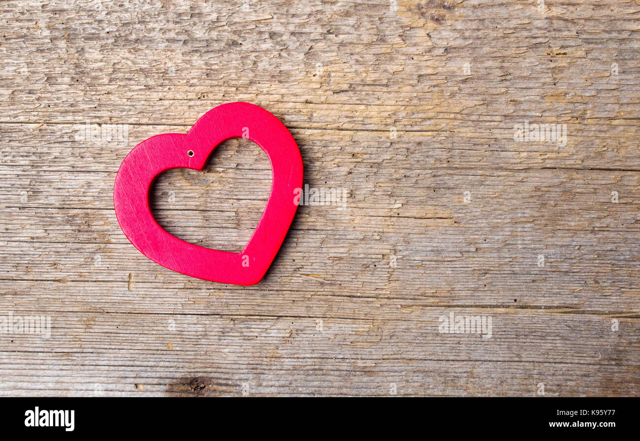Heart shape on a rustic wooden background Stock Photo