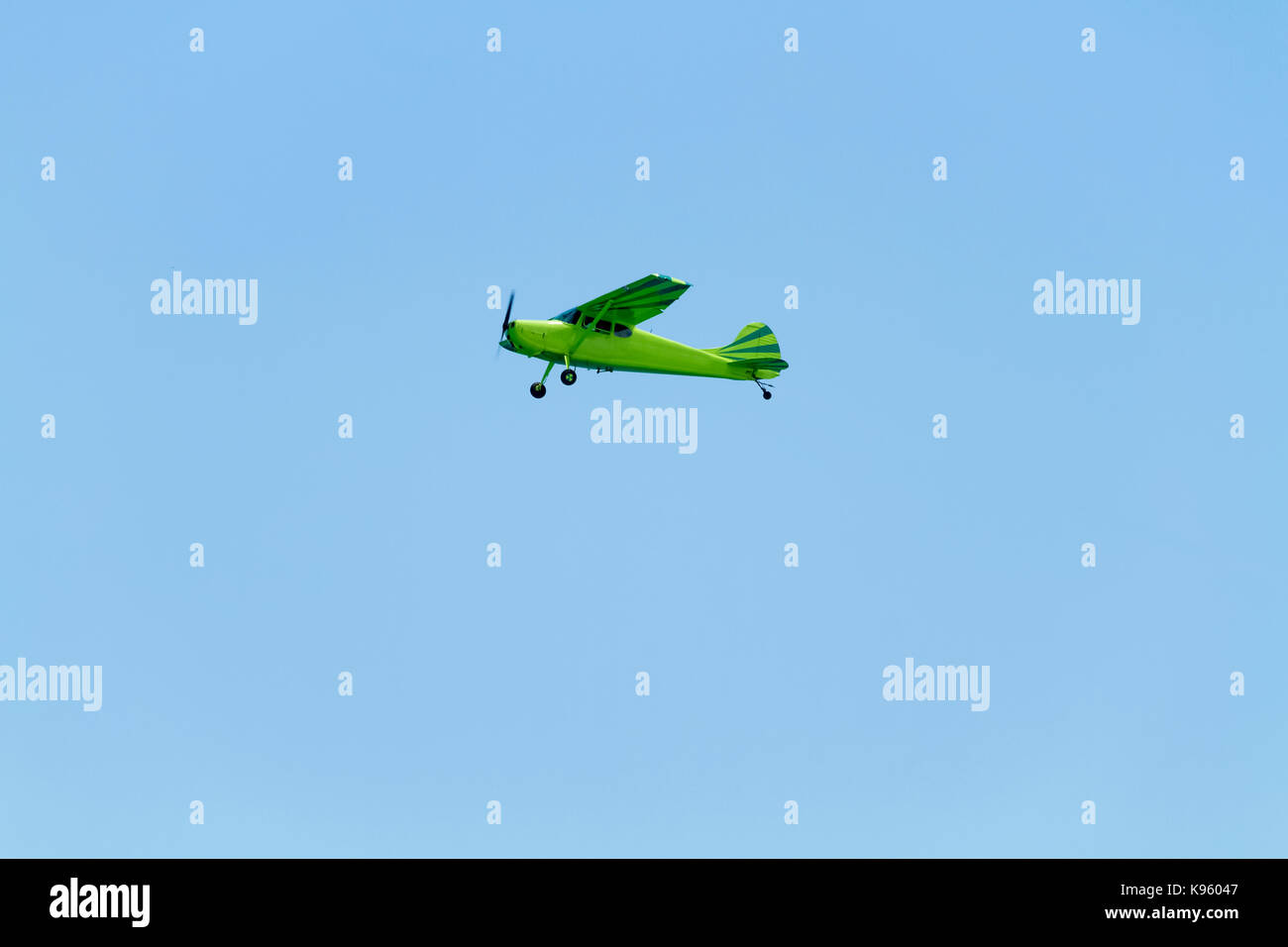 Airplane against blue sky Stock Photo
