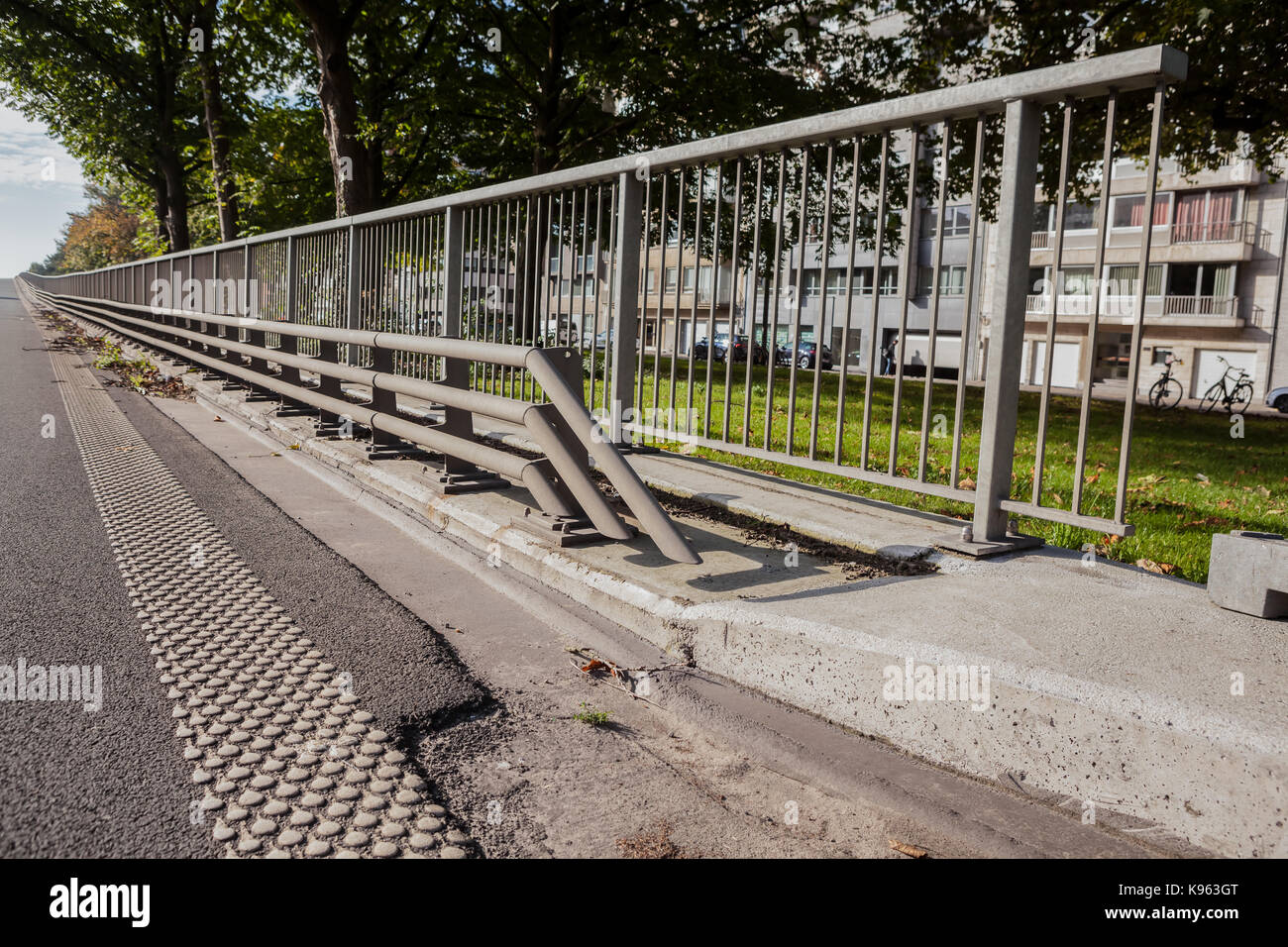 This railing is flying over from Ghent and was today a careless Sunday Stock Photo