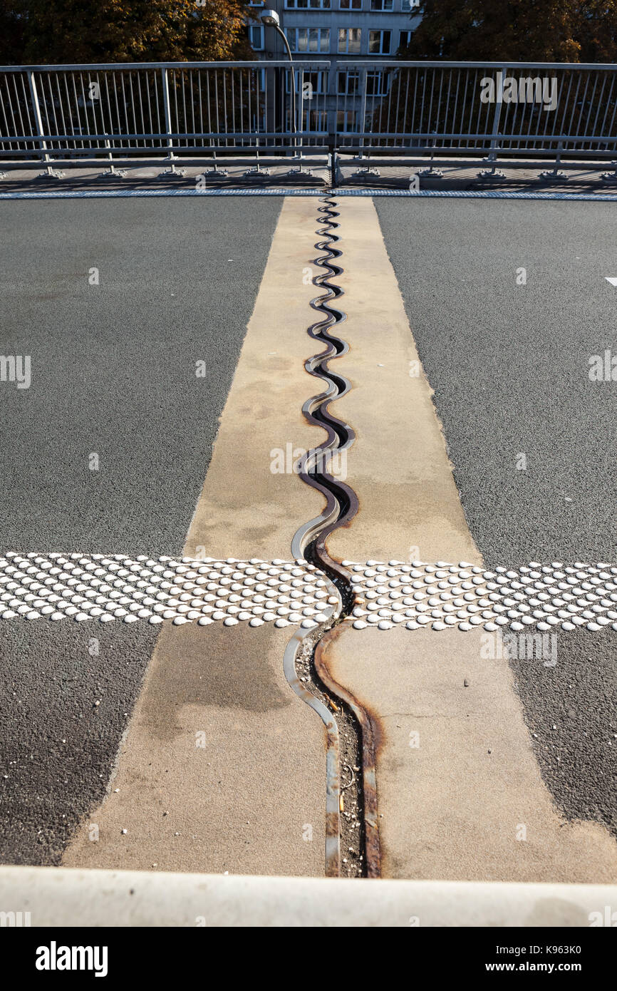 asphalt separation in the highway bridge roadway Stock Photo