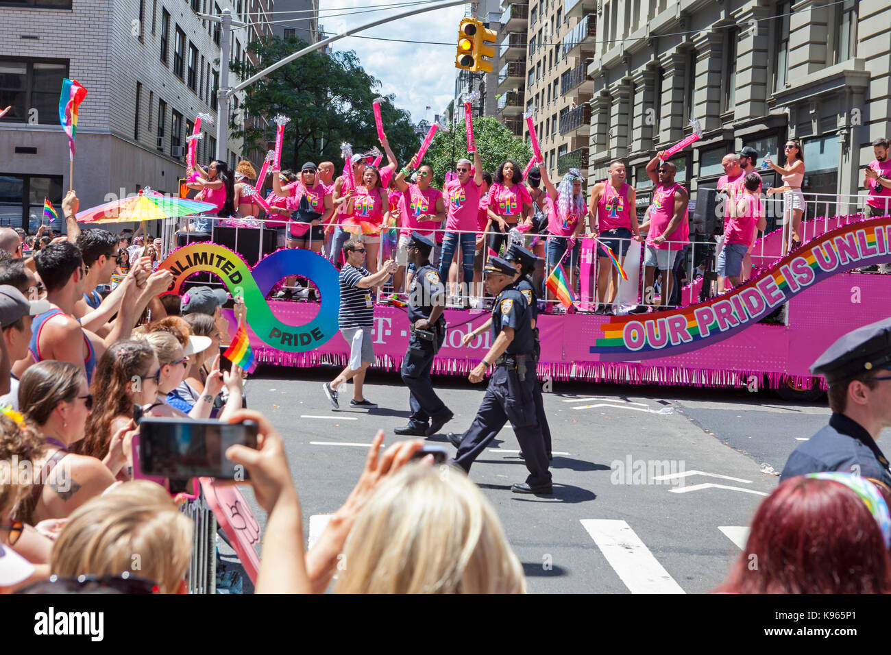 Marchers in the Gay Pride Parade on 5th Avenue in Manhattan, New York City, New York. Stock Photo