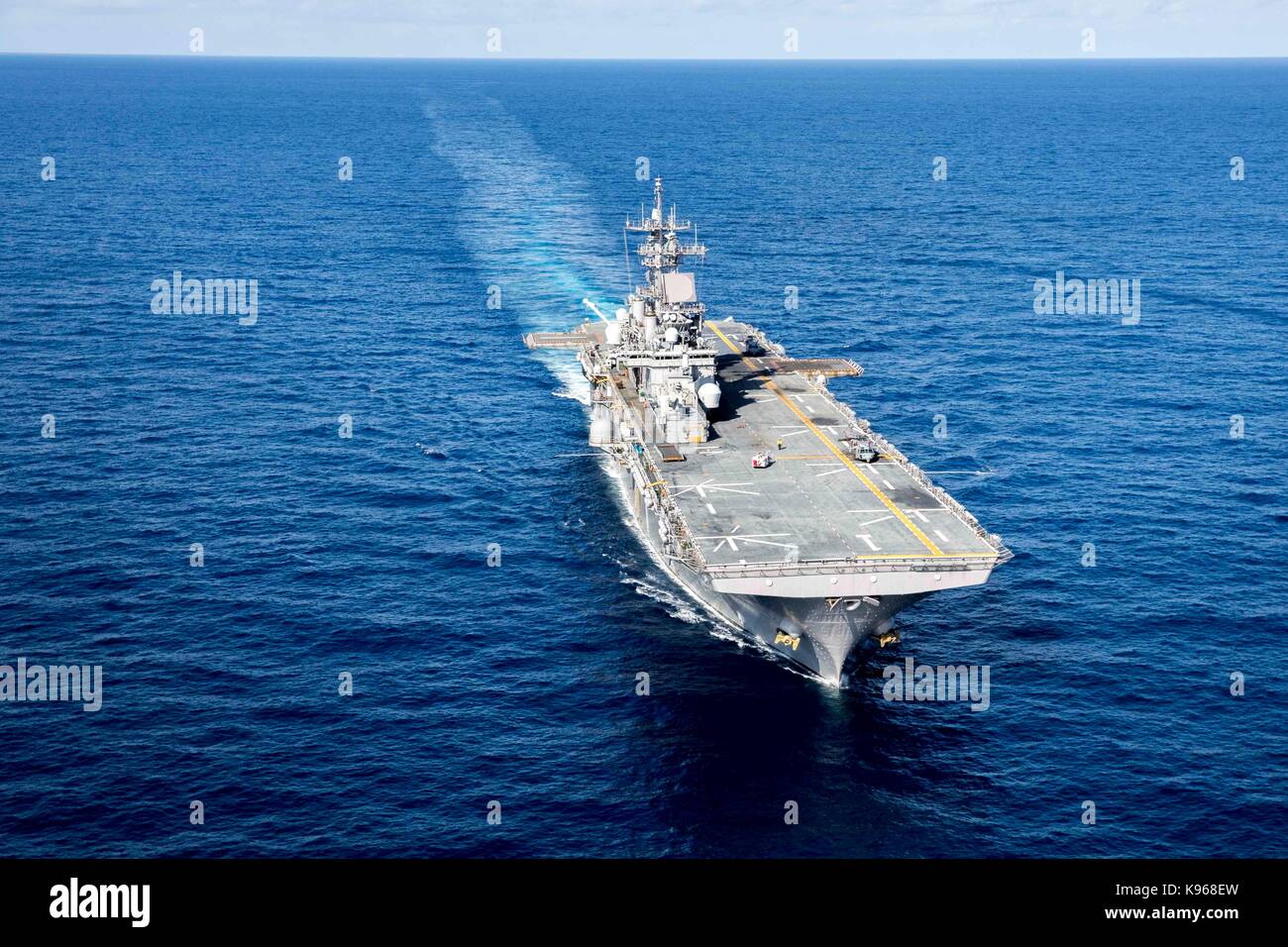 The amphibious assault ship USS Wasp (LHD 1) transits the Caribbean Sea. Stock Photo