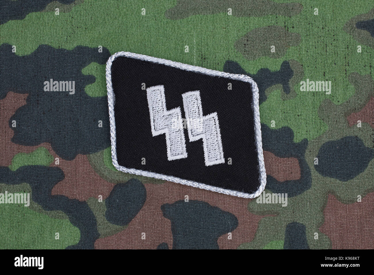 WW2 German Waffen-SS military insignia on SS camouflage uniform Stock Photo