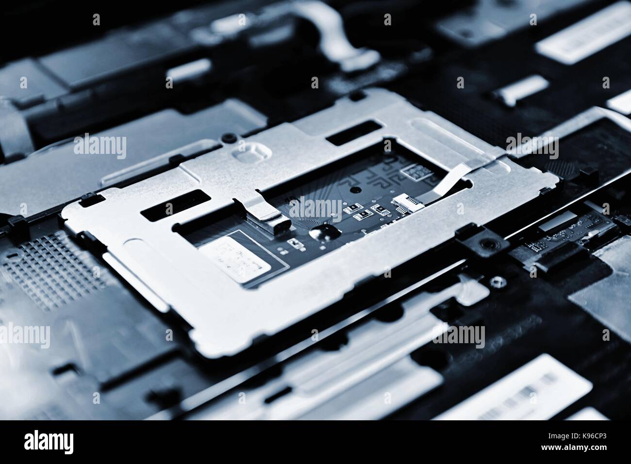 Closeup of the chip of the old notebook computer motherboard. Stock Photo