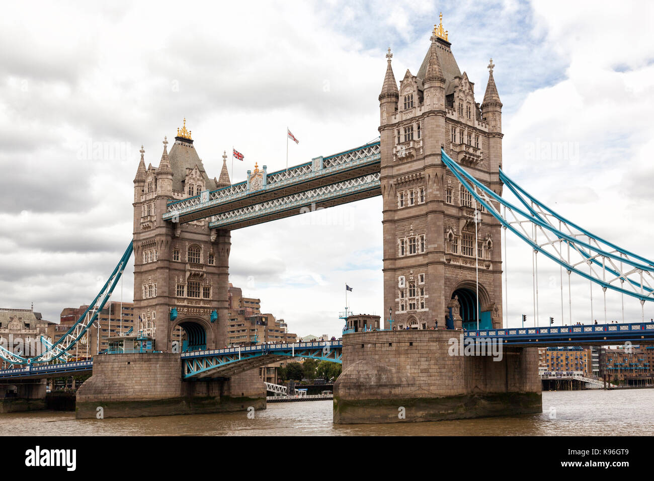 Tower Bridge in London, UK, over the river Thames, with a cloudy sky as background Stock Photo