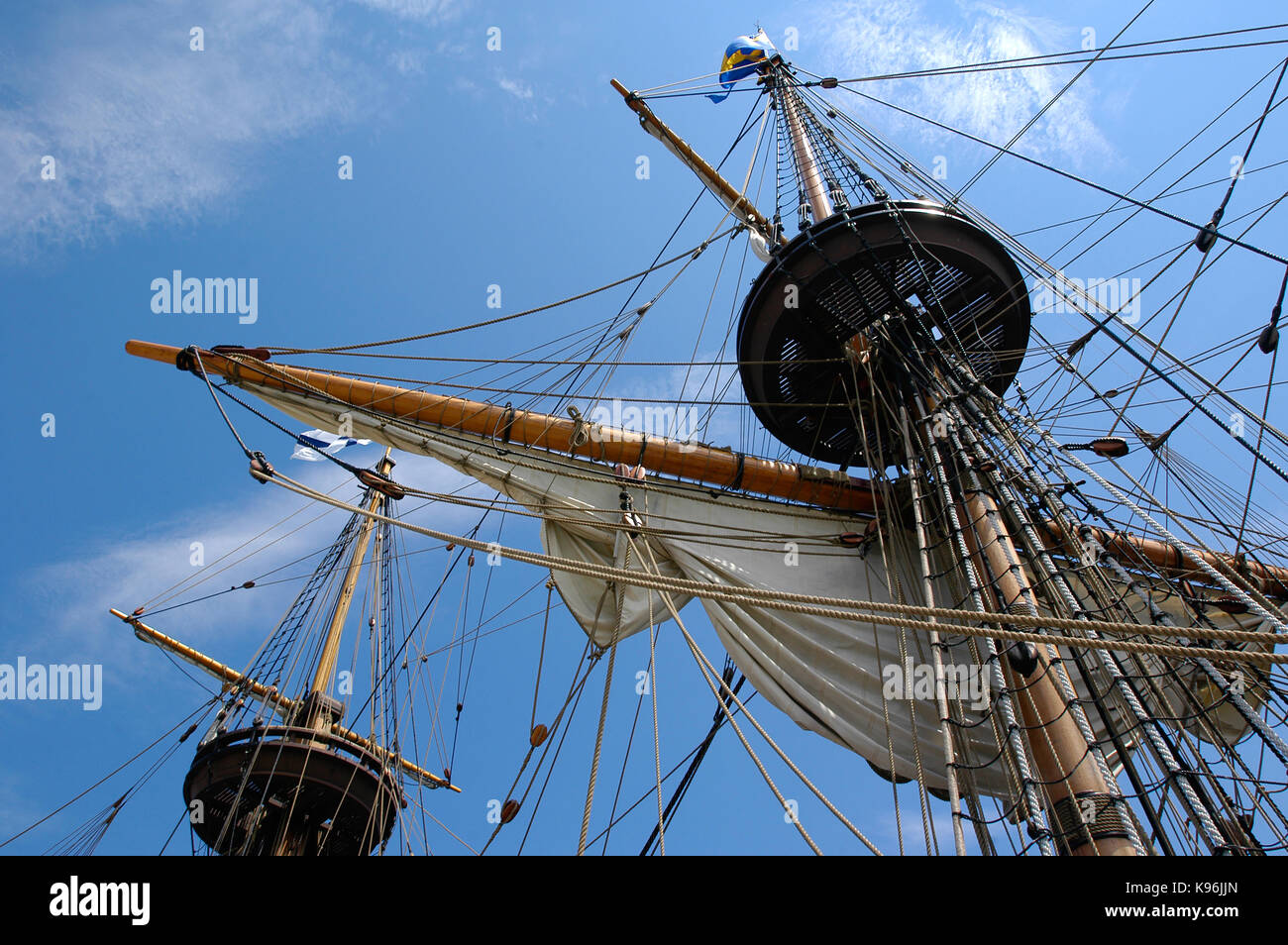 Mast silhouetted against the summer sky - mast of the Kalmar Nyckel ...