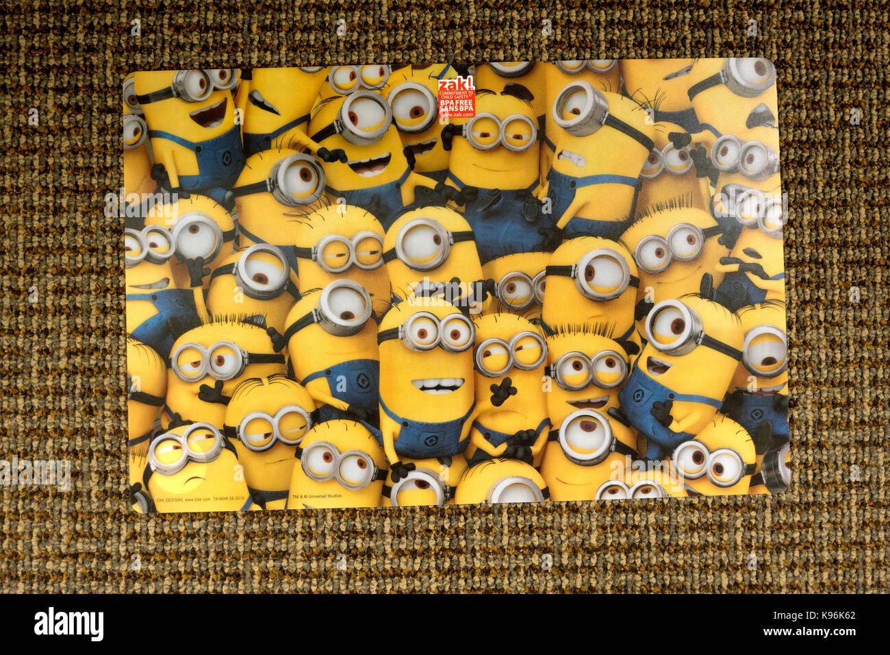 Table place mat filled with Minions. St Paul Minnesota MN USA Stock Photo