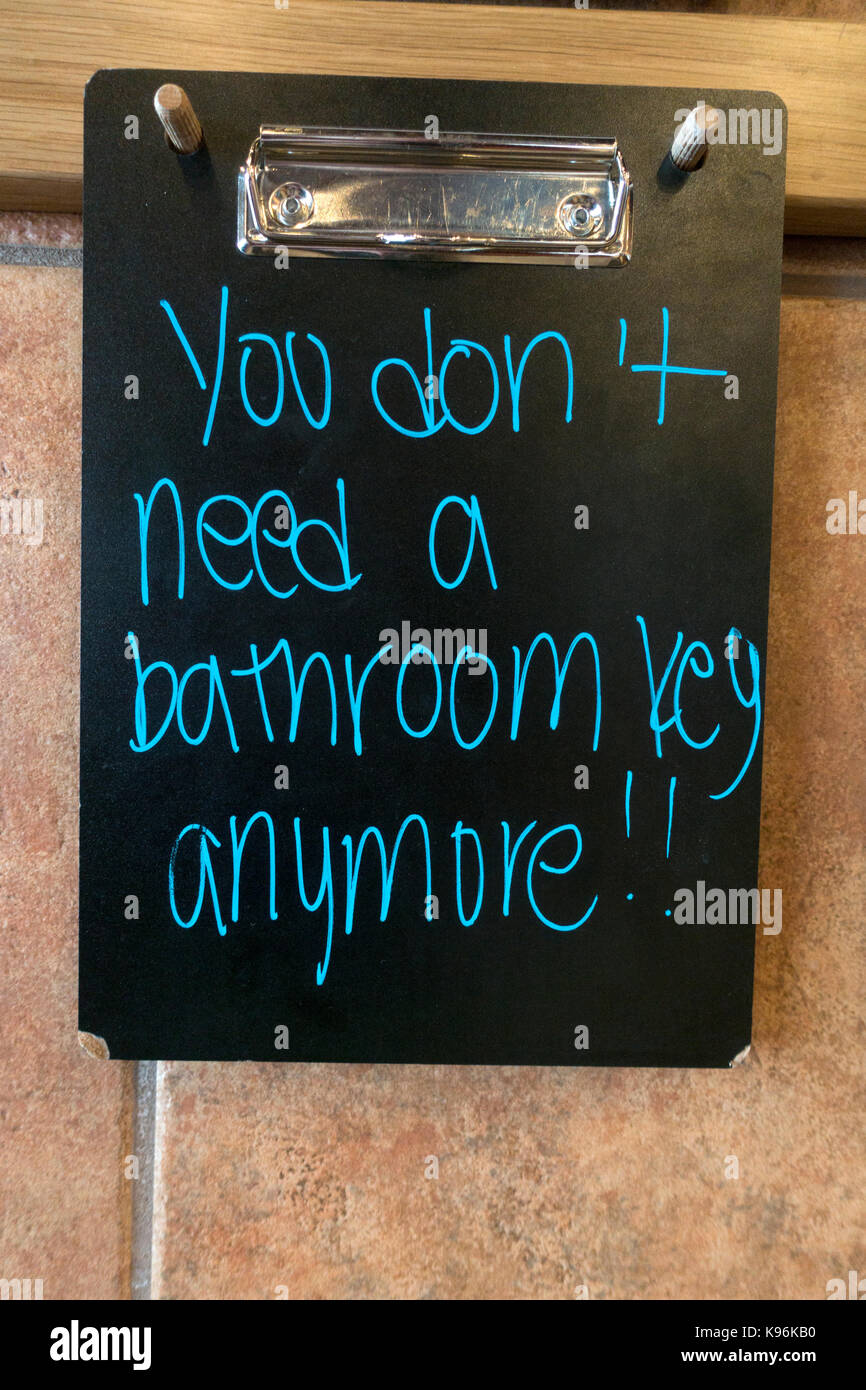 Sign 'You don't need a bathroom key anymore!' St Paul Minnesota MN USA Stock Photo