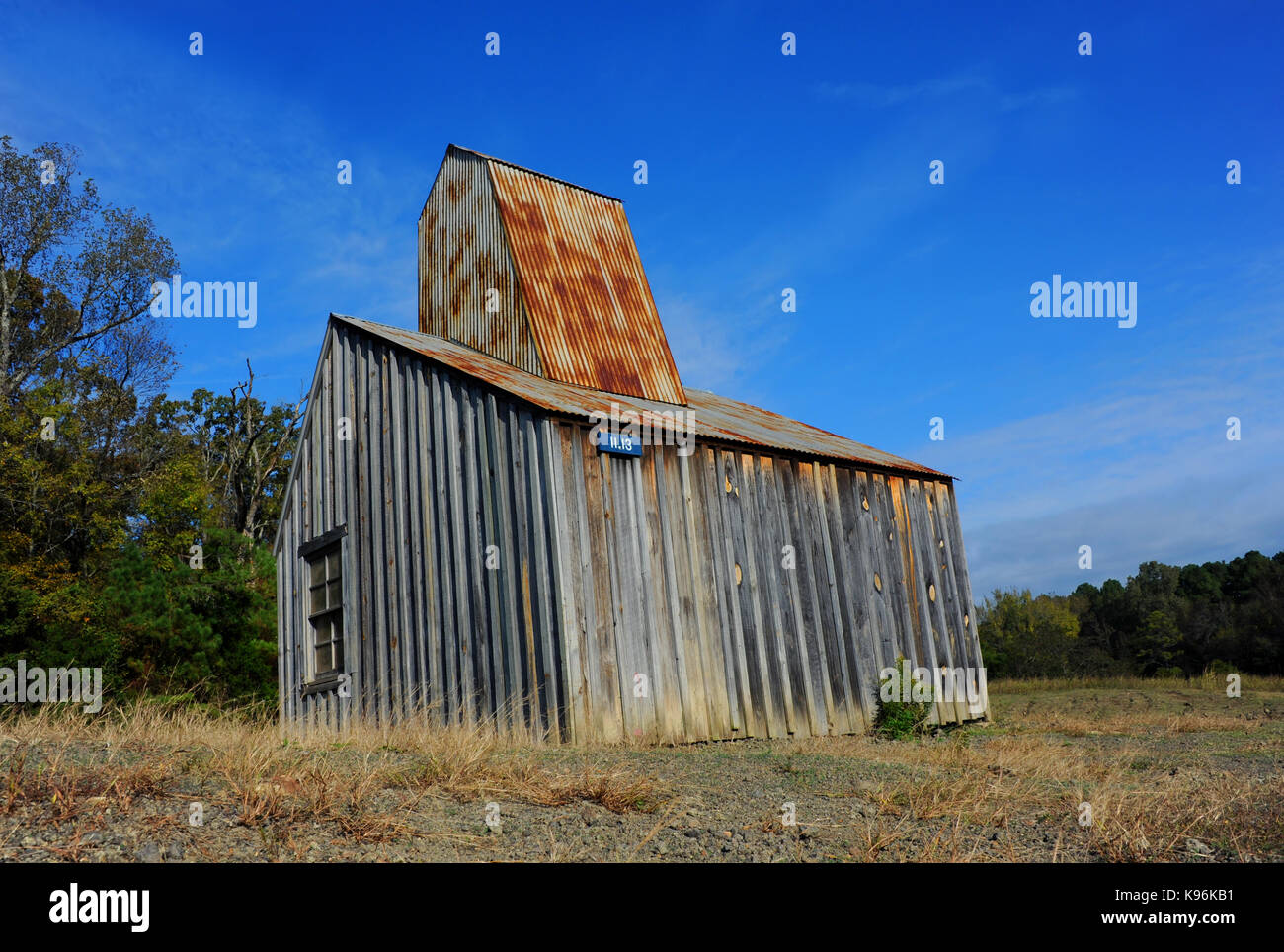 Historic Ozard Diamond Mine Shaft House sits on the field at the Crater of Diamonds State Park in Arkansas. Stock Photo