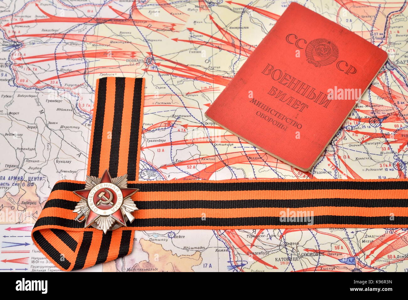 ST.PETERSBURG, RUSSIA - APRIL 27, 2017: Order of the Patriotic War in St. George's ribbon and a military card of the USSR are in the military card of  Stock Photo