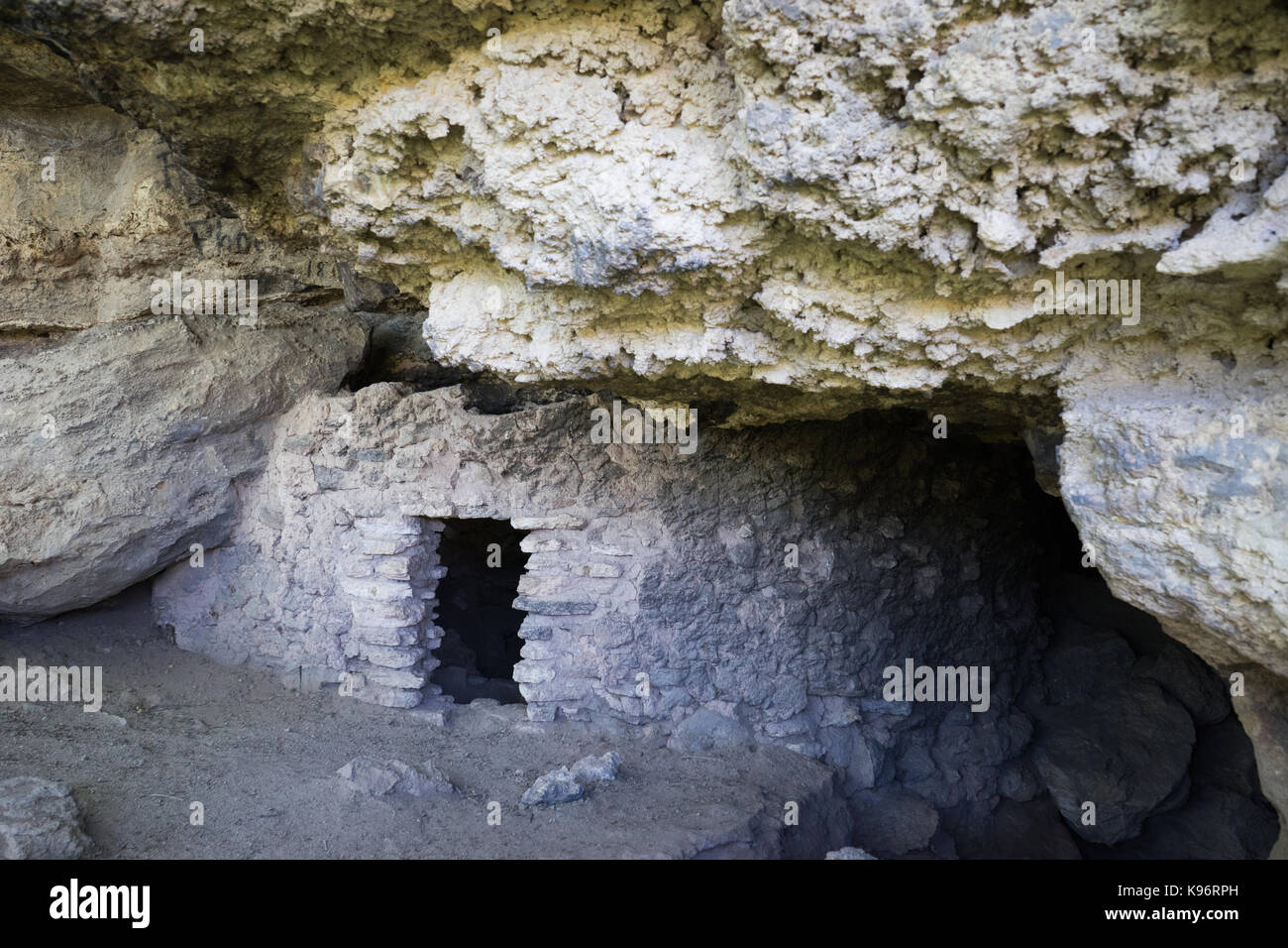 A home built into the caves at Montezuma's Well Stock Photo Alamy