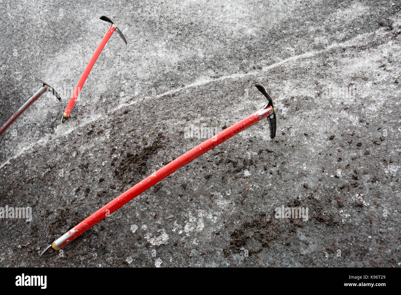Ice axes are stuck in Skaftafell Glacier. Stock Photo