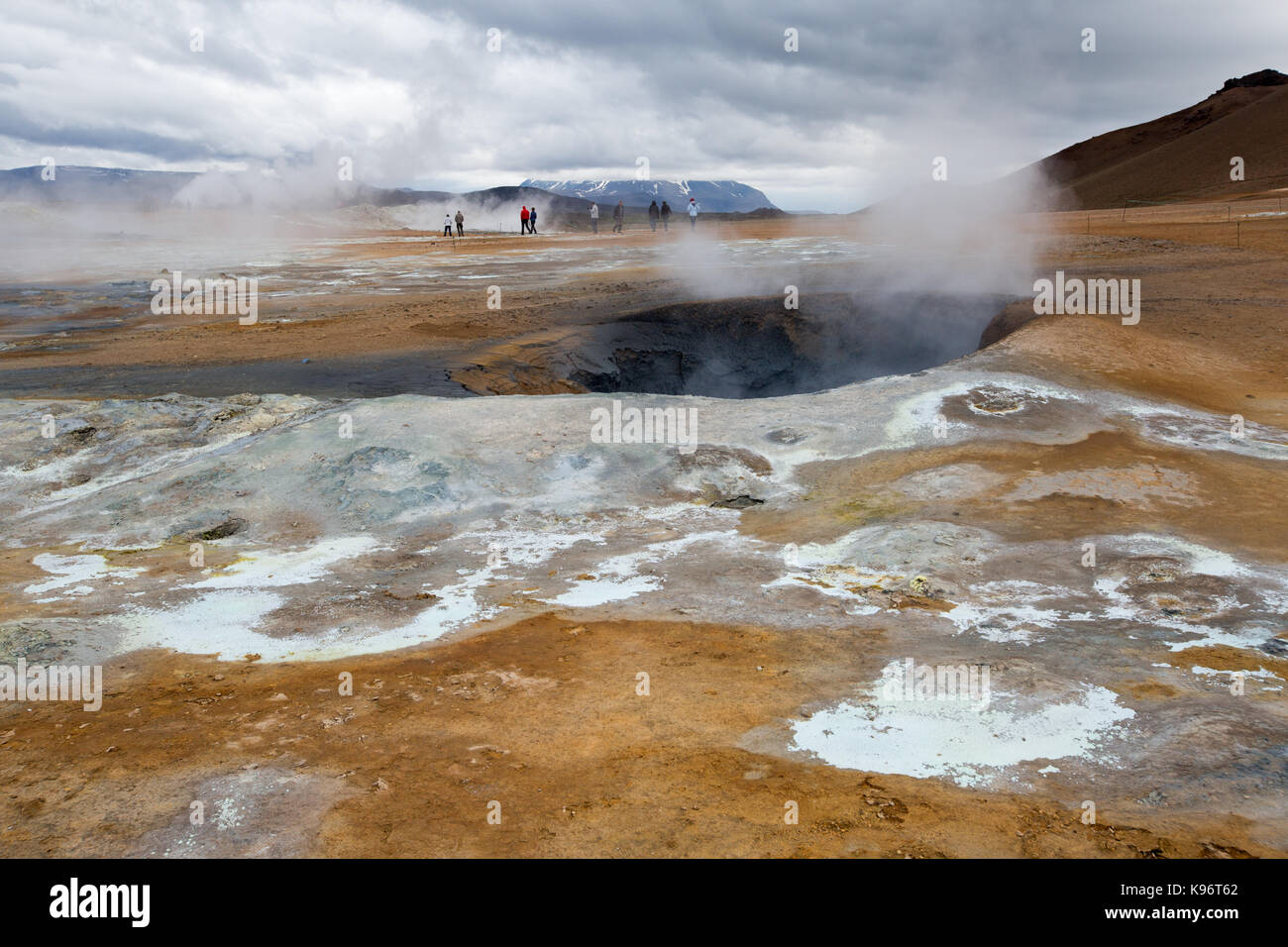 A view of the steaming mud pots geothermal area near Lake Myvatn. Stock Photo