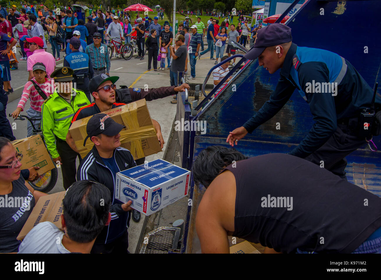 Quito, Ecuador April,17, 2016 Crowd of people of Quito providing